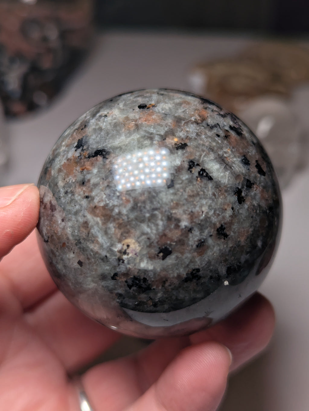 Yooperlite crystal sphere with Orange UV