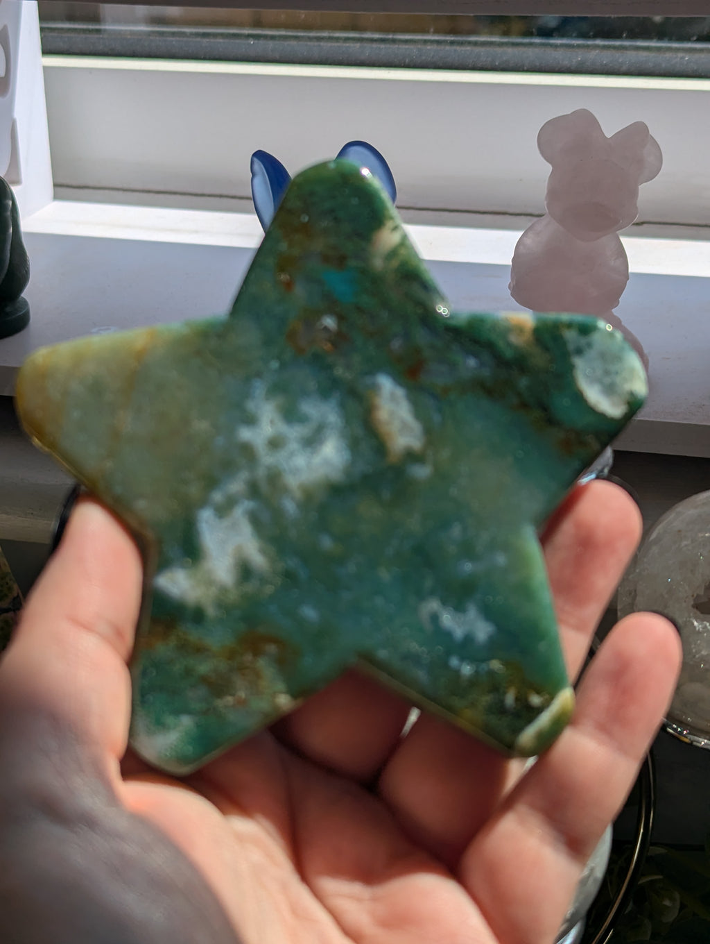 Moss agate crystal star with stand