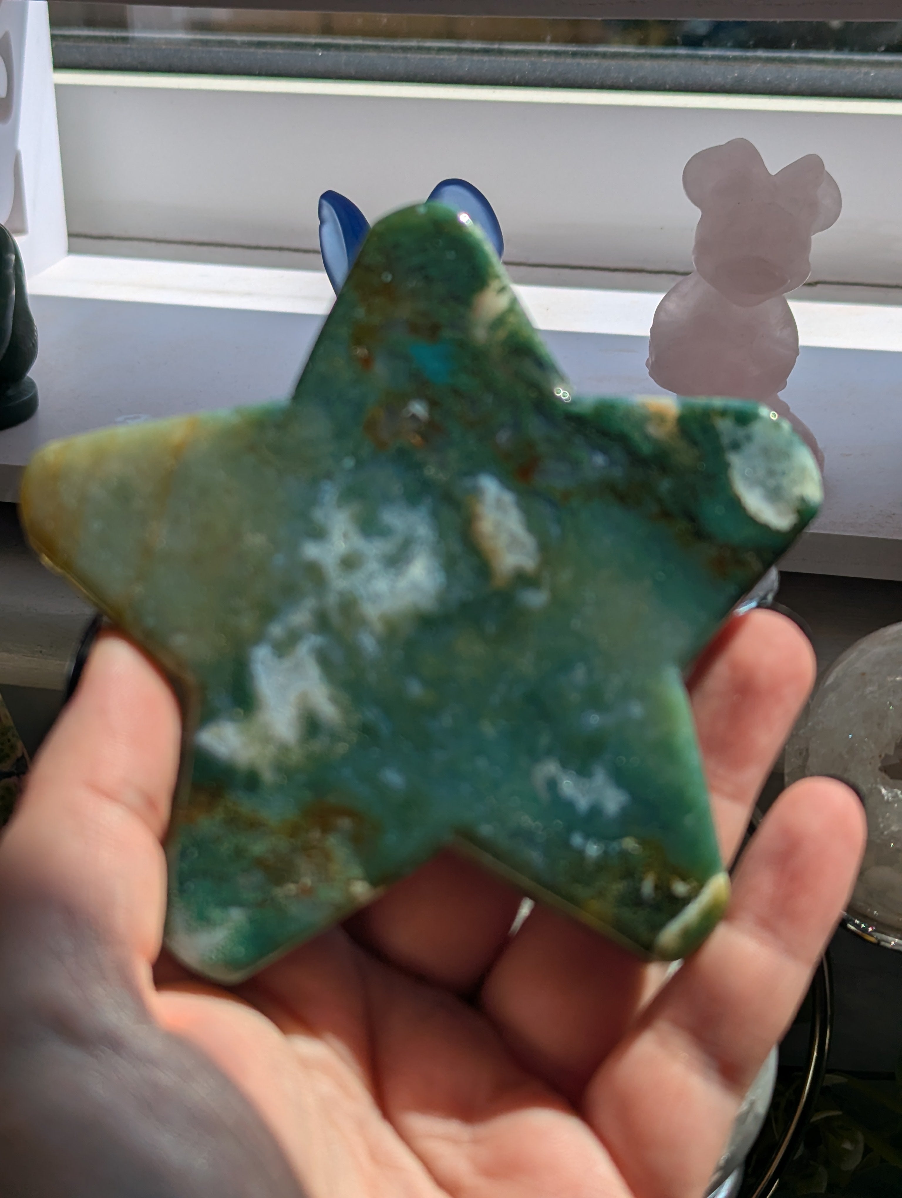 Moss agate crystal star with stand