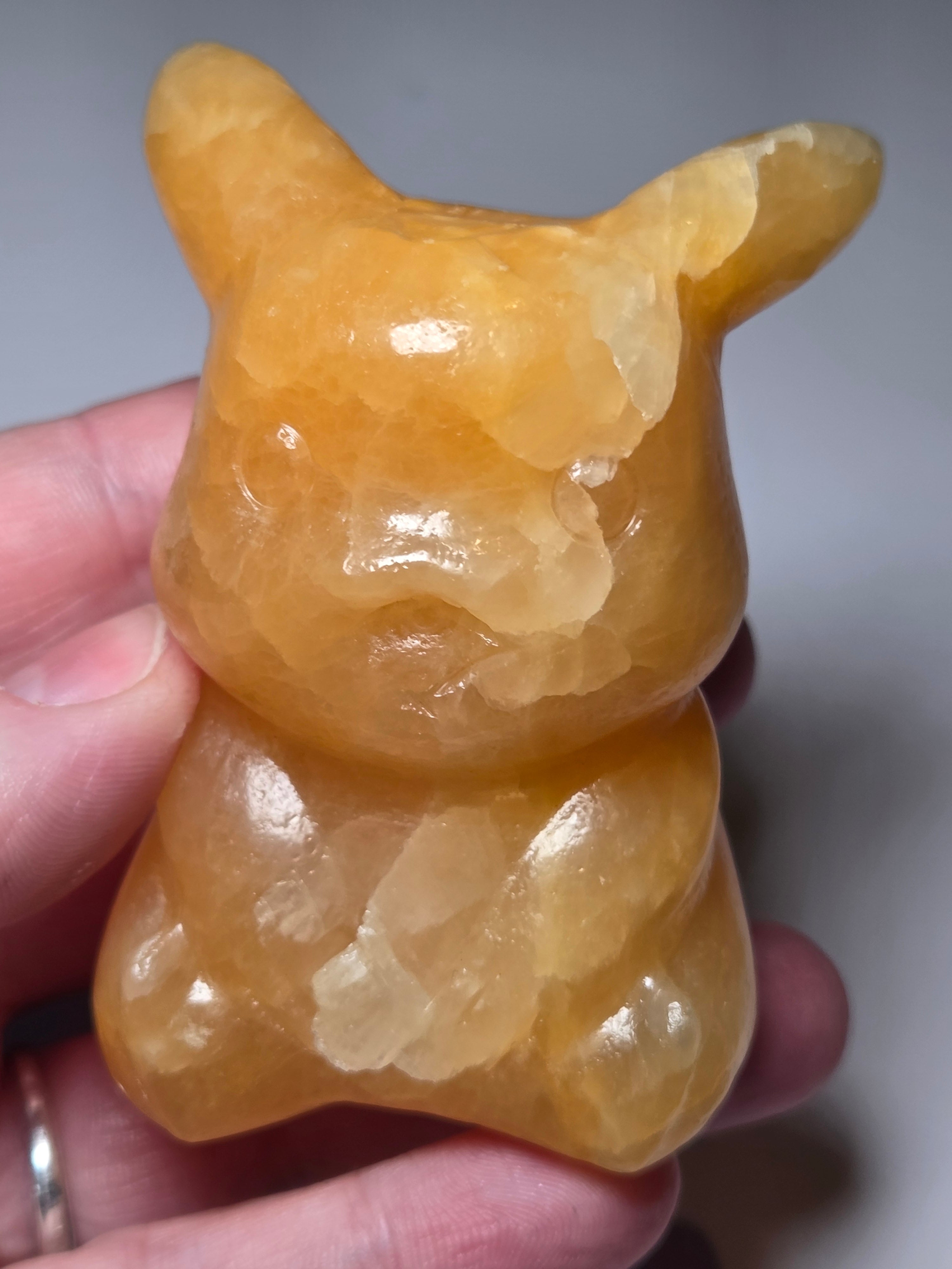 Orange calcite crystal pikachu pokemon carving