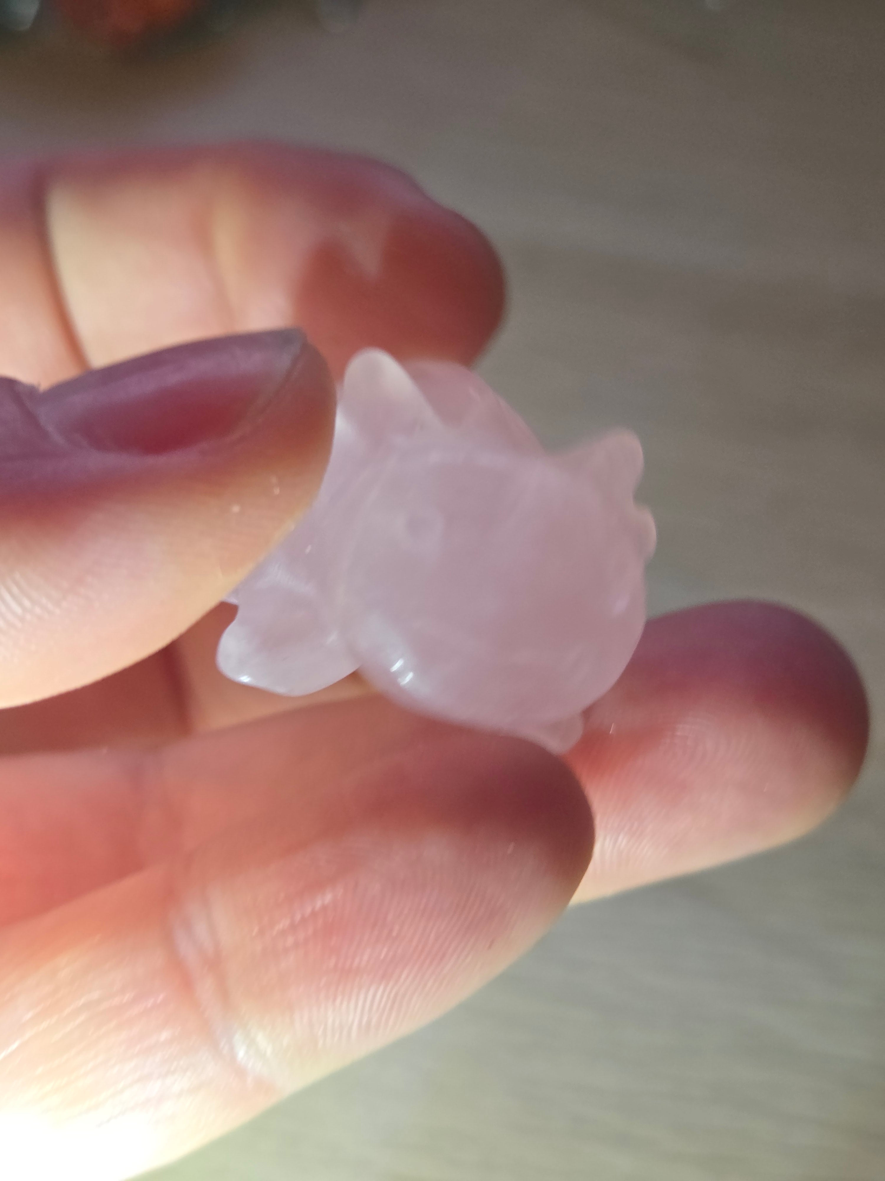 Rose quartz crystal axolotl carving