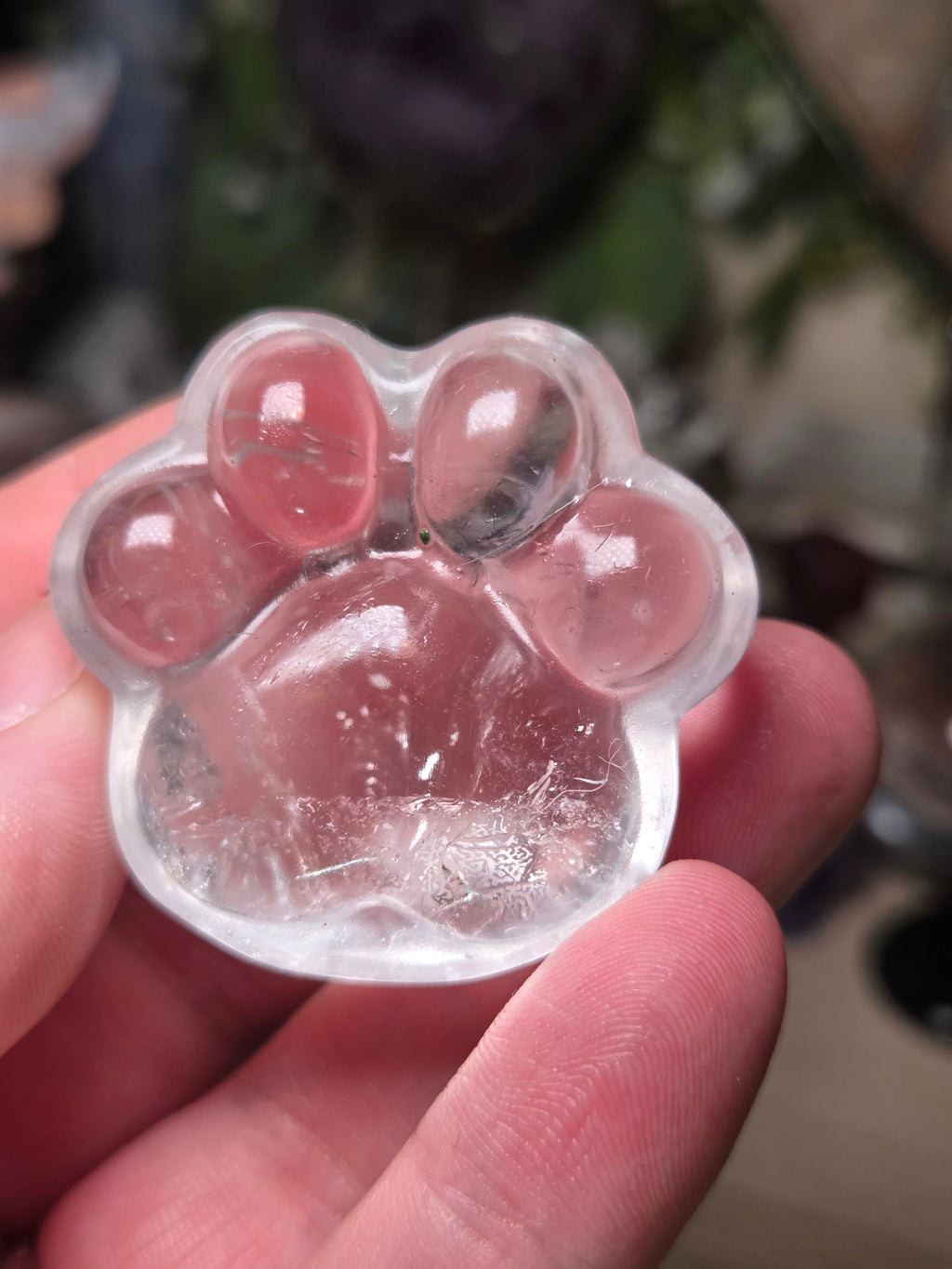Clear quartz crystal paw print carving