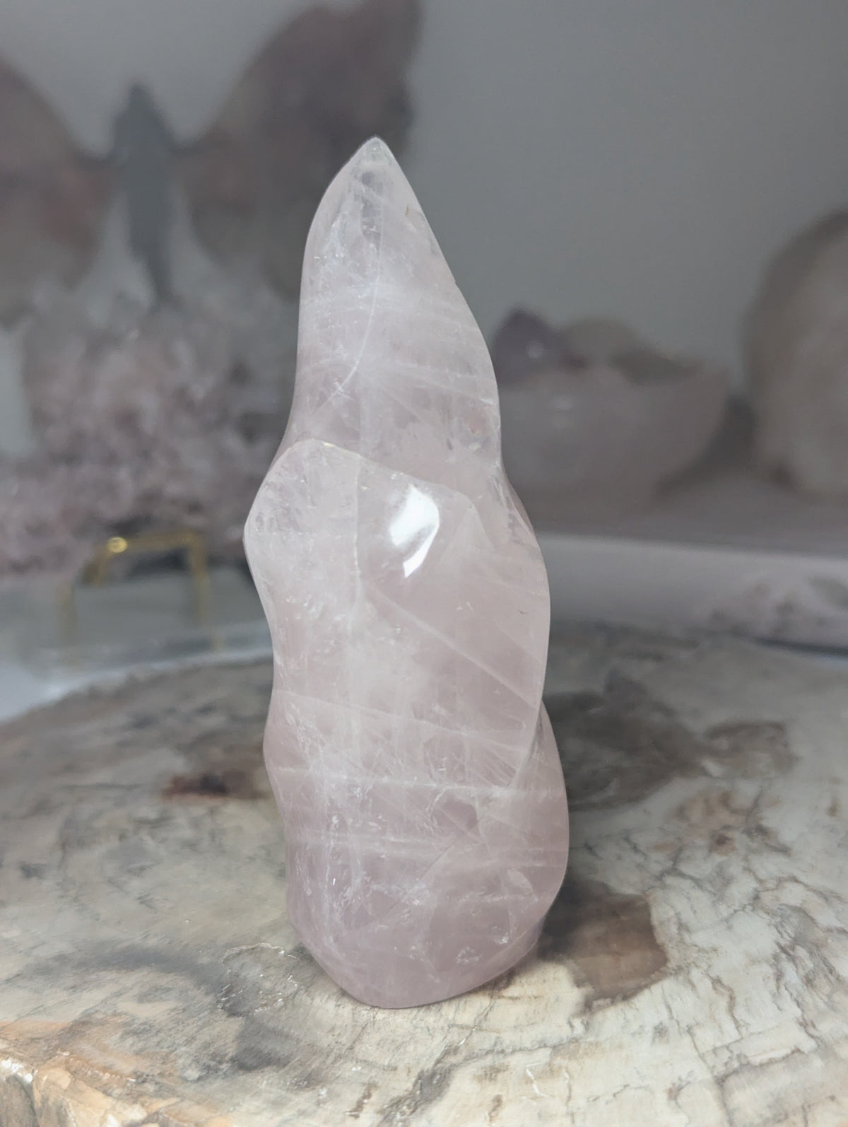Rose quartz crystal flame carving