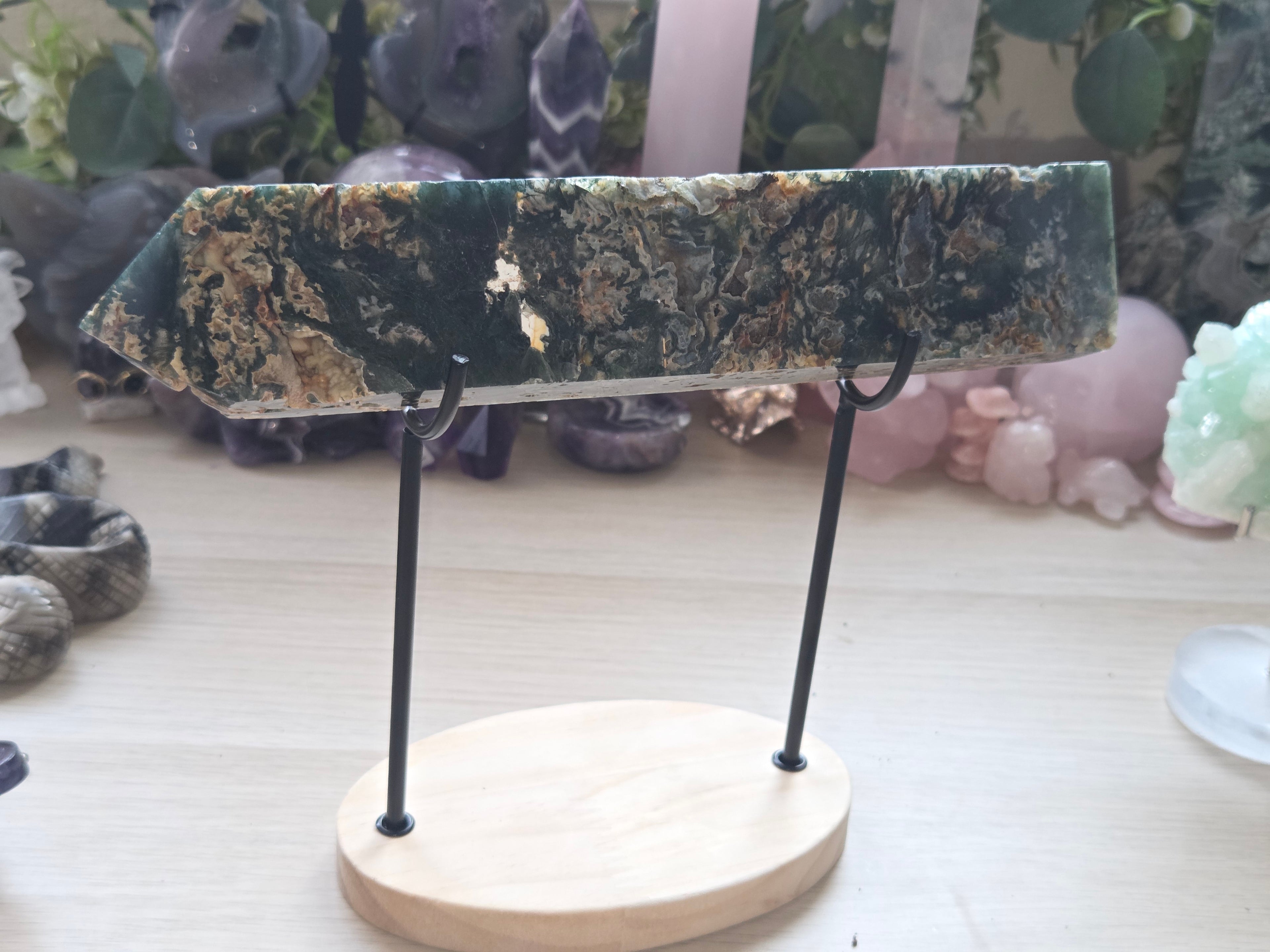 Large Crystal moss agate tower with imperfections as does not stand alone comes with stand