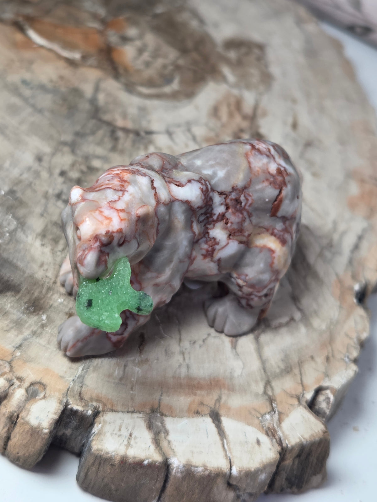 Red Vain Jasper crystal bear carving with fish