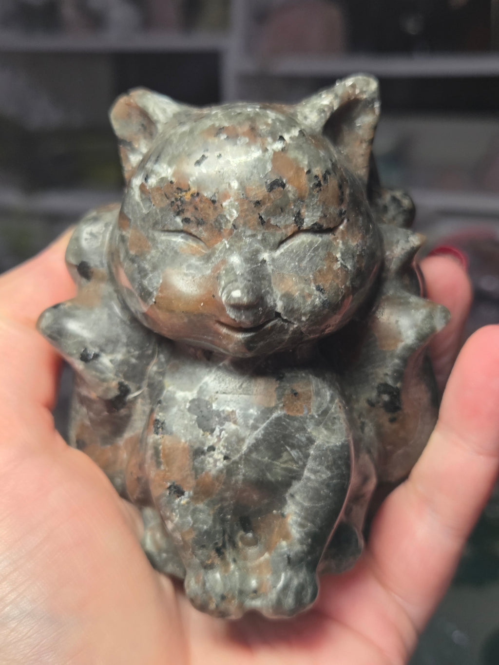 Large Yooperlite crystal 9 tail fox carving