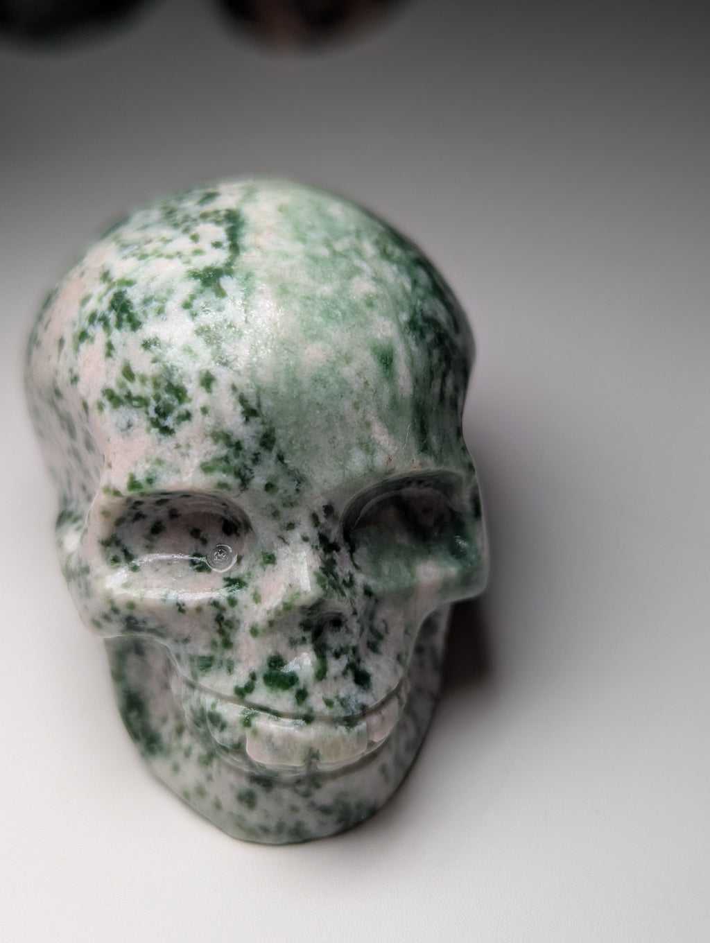 Green spotted Jasper crystal skull