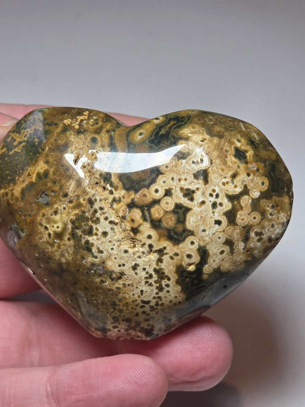 Ocean Jasper crystal heart carving with imperfections