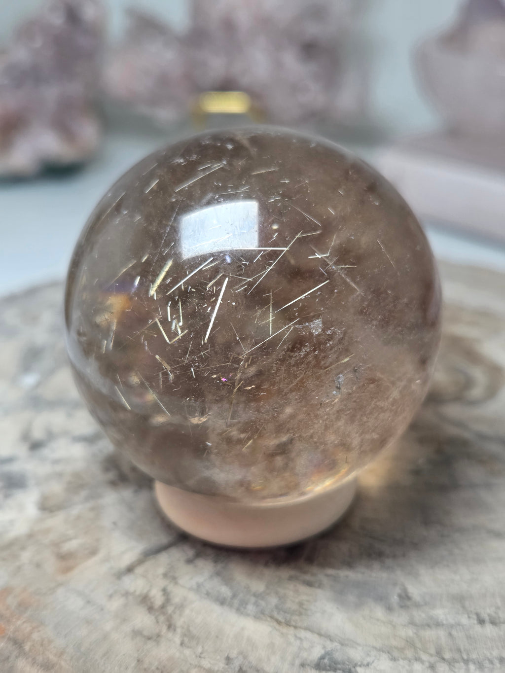 Golden rutile crystal sphere