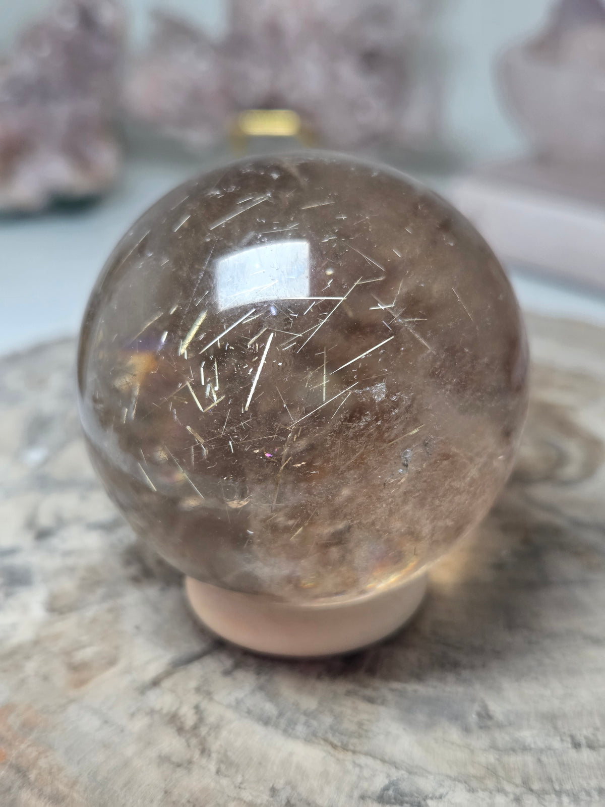 Golden rutile crystal sphere