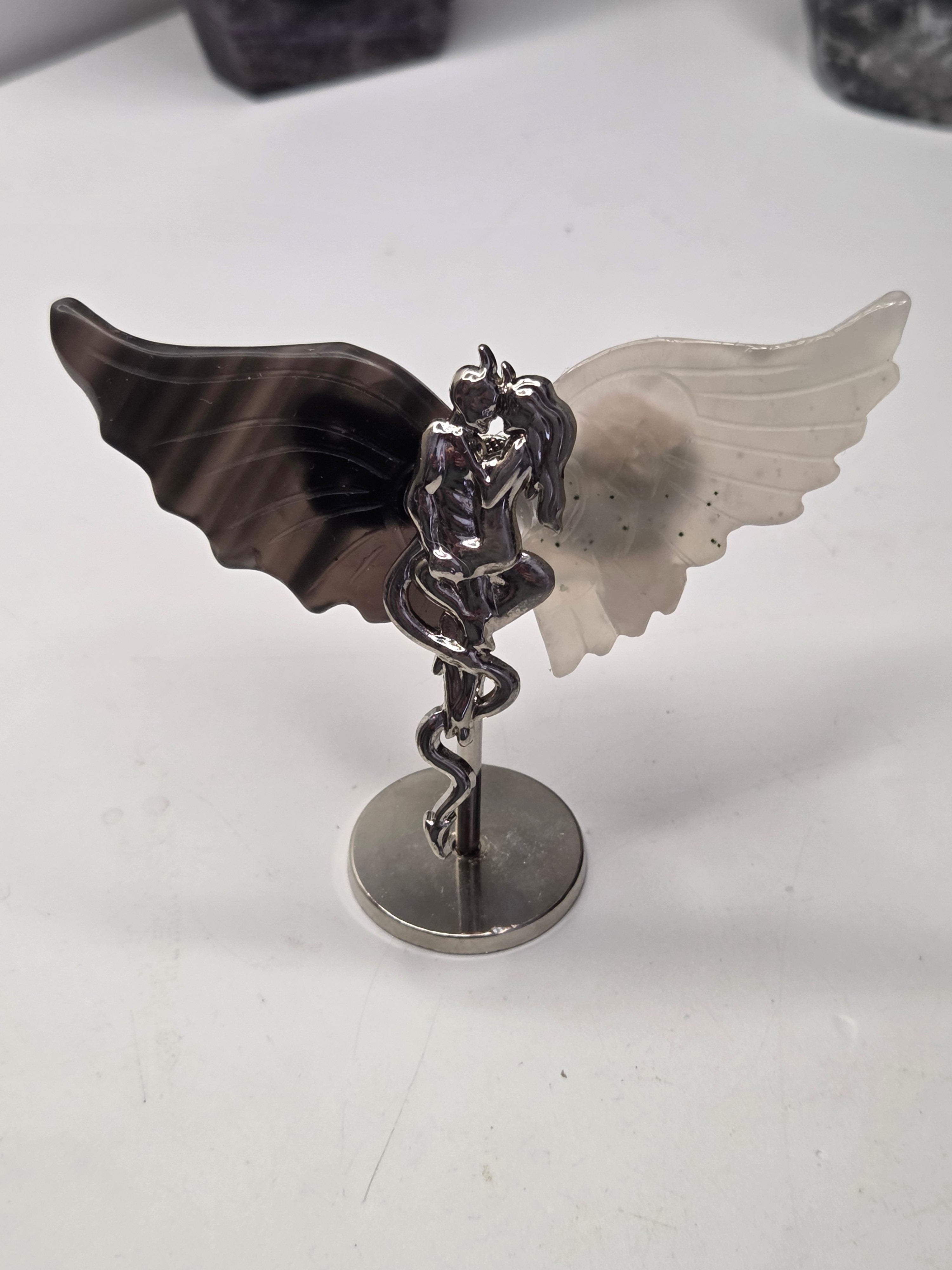 Devil and angel crystal carving
