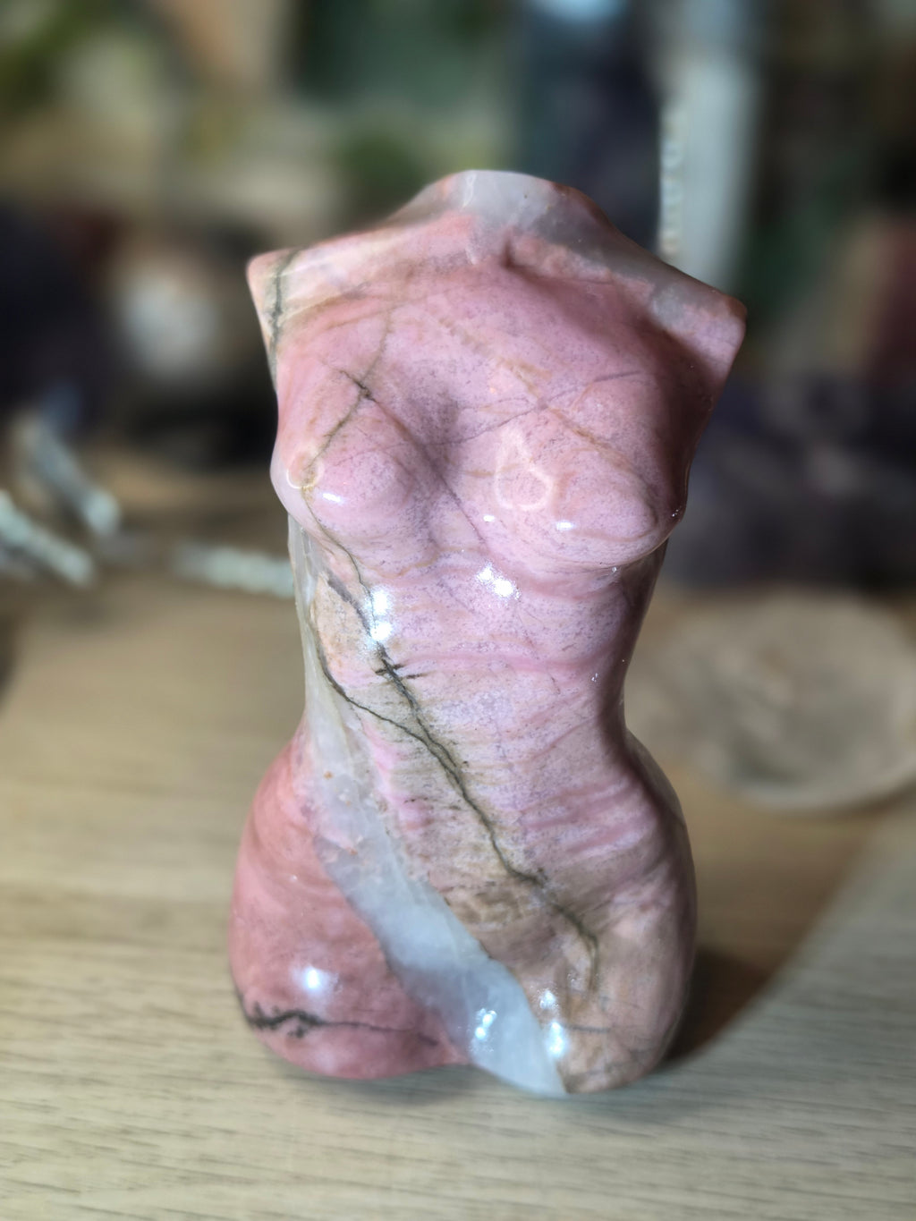 Rhodonite crystal female body carving
