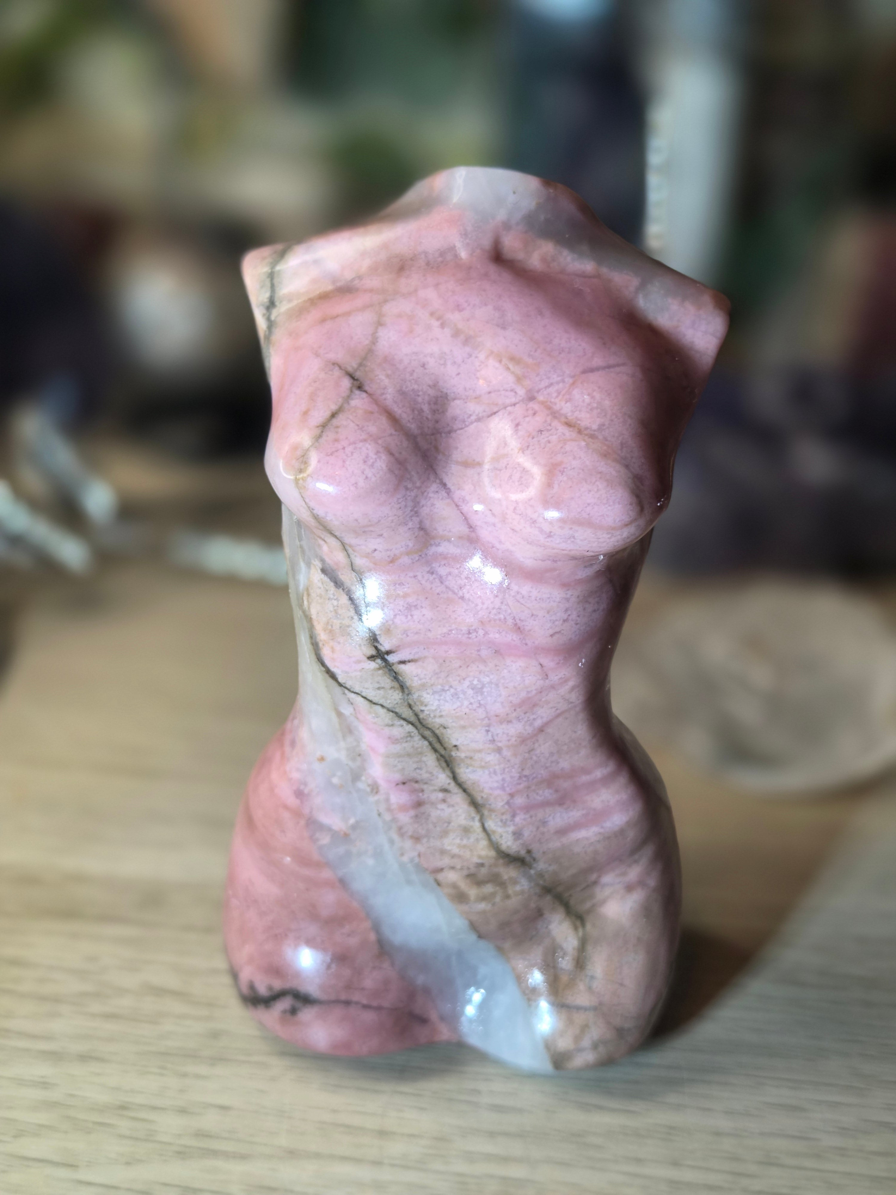 Rhodonite crystal female body carving