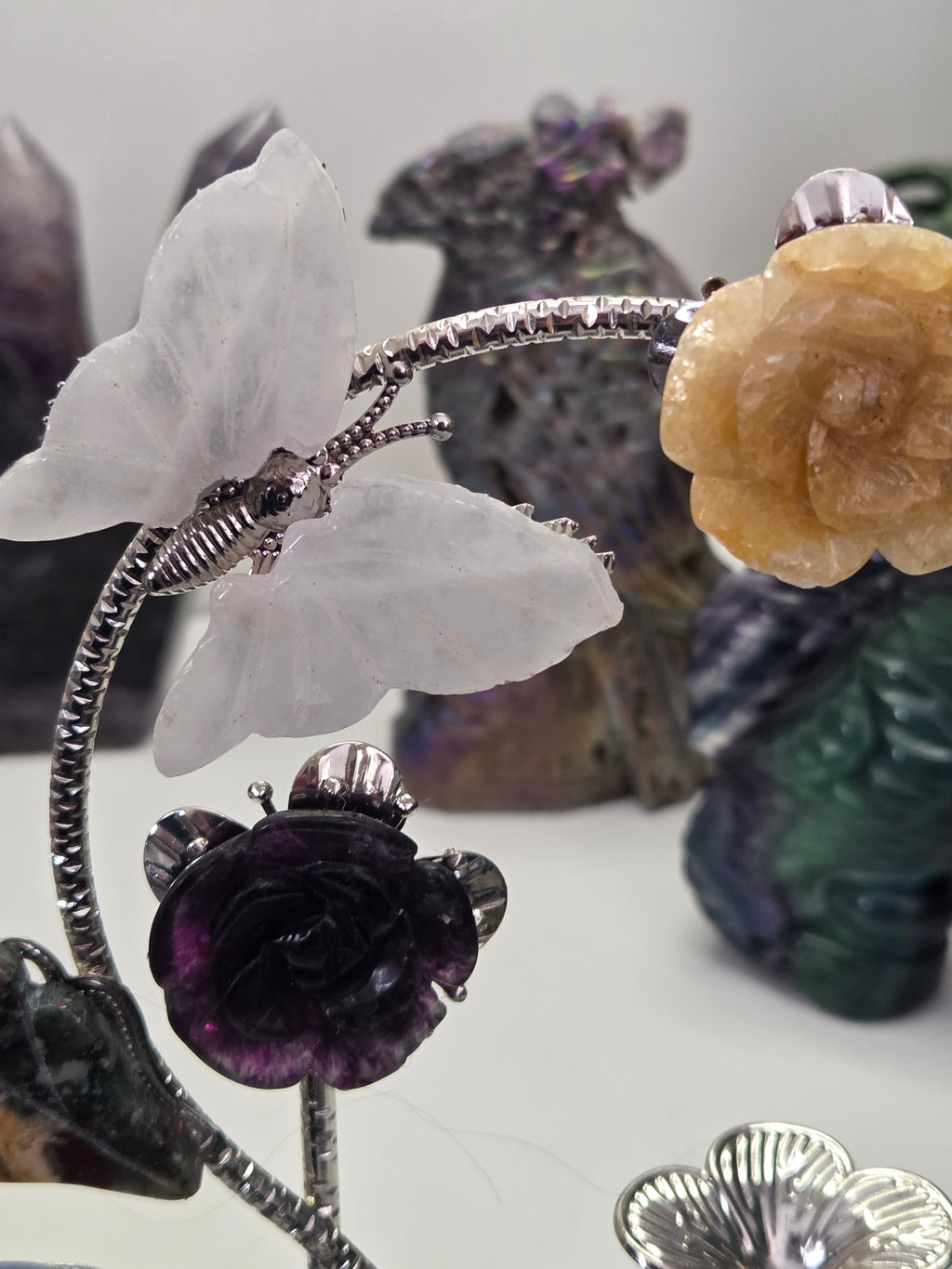 Flower and butterfly sphere stand