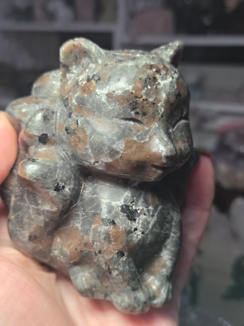Large Yooperlite crystal 9 tail fox carving