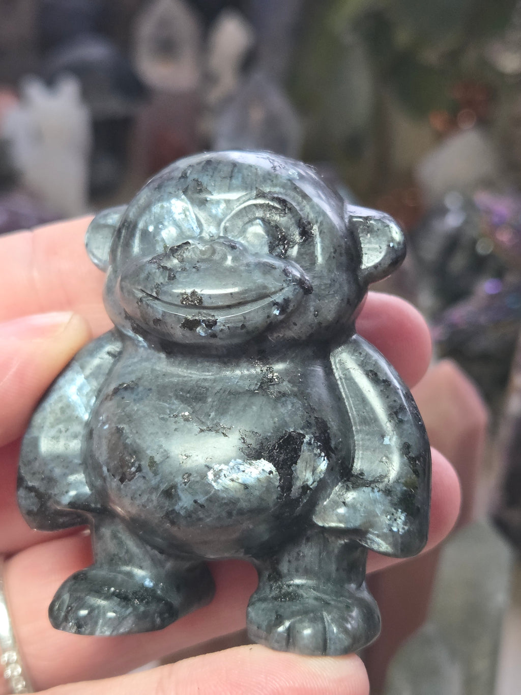 Larvakite crystal monkey carving