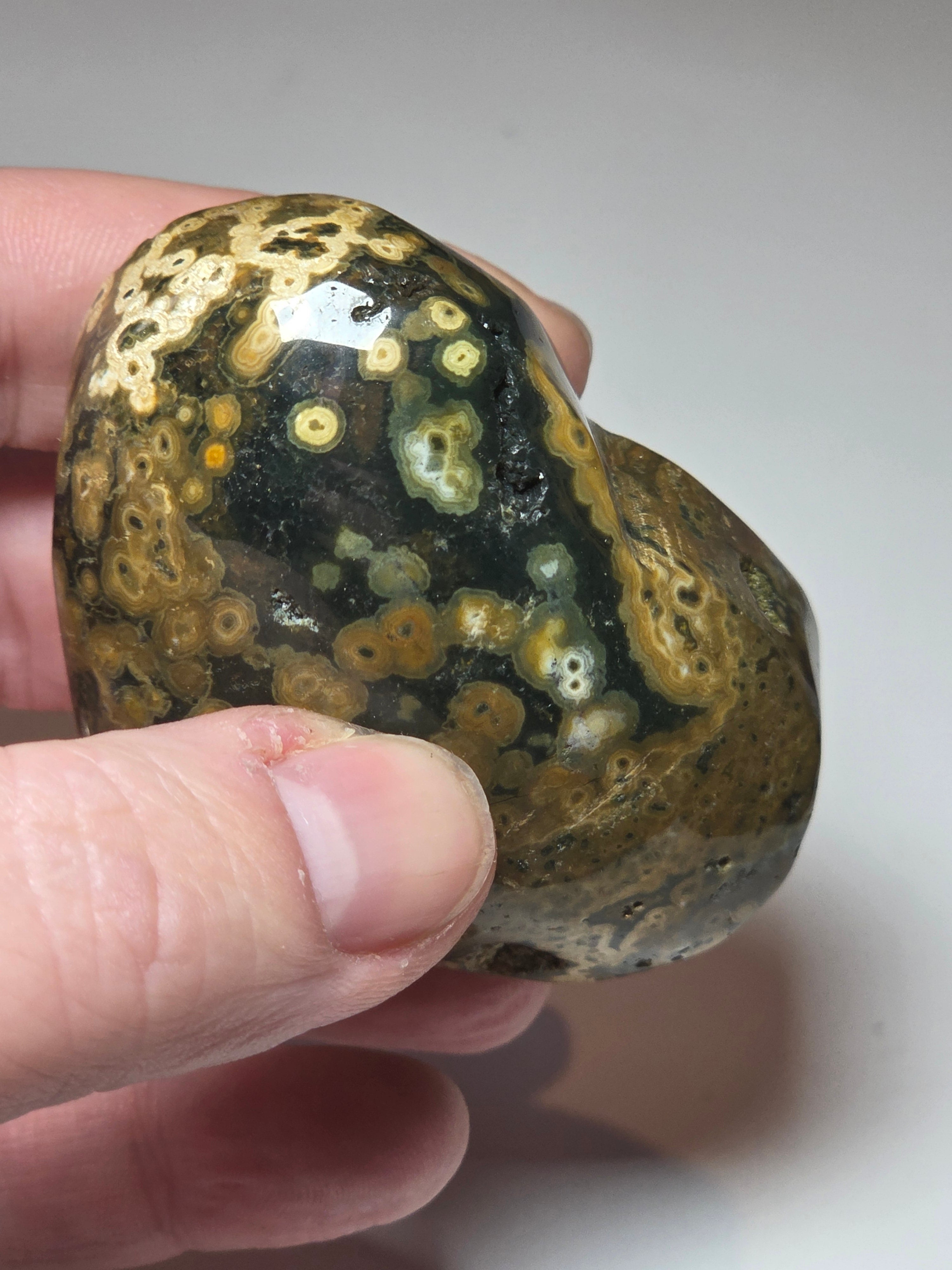 Ocean Jasper crystal heart carving with imperfections