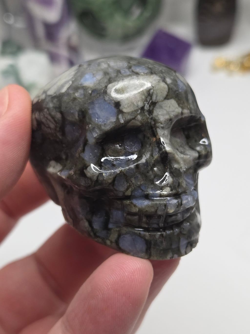 Blue spot crystal skull carving