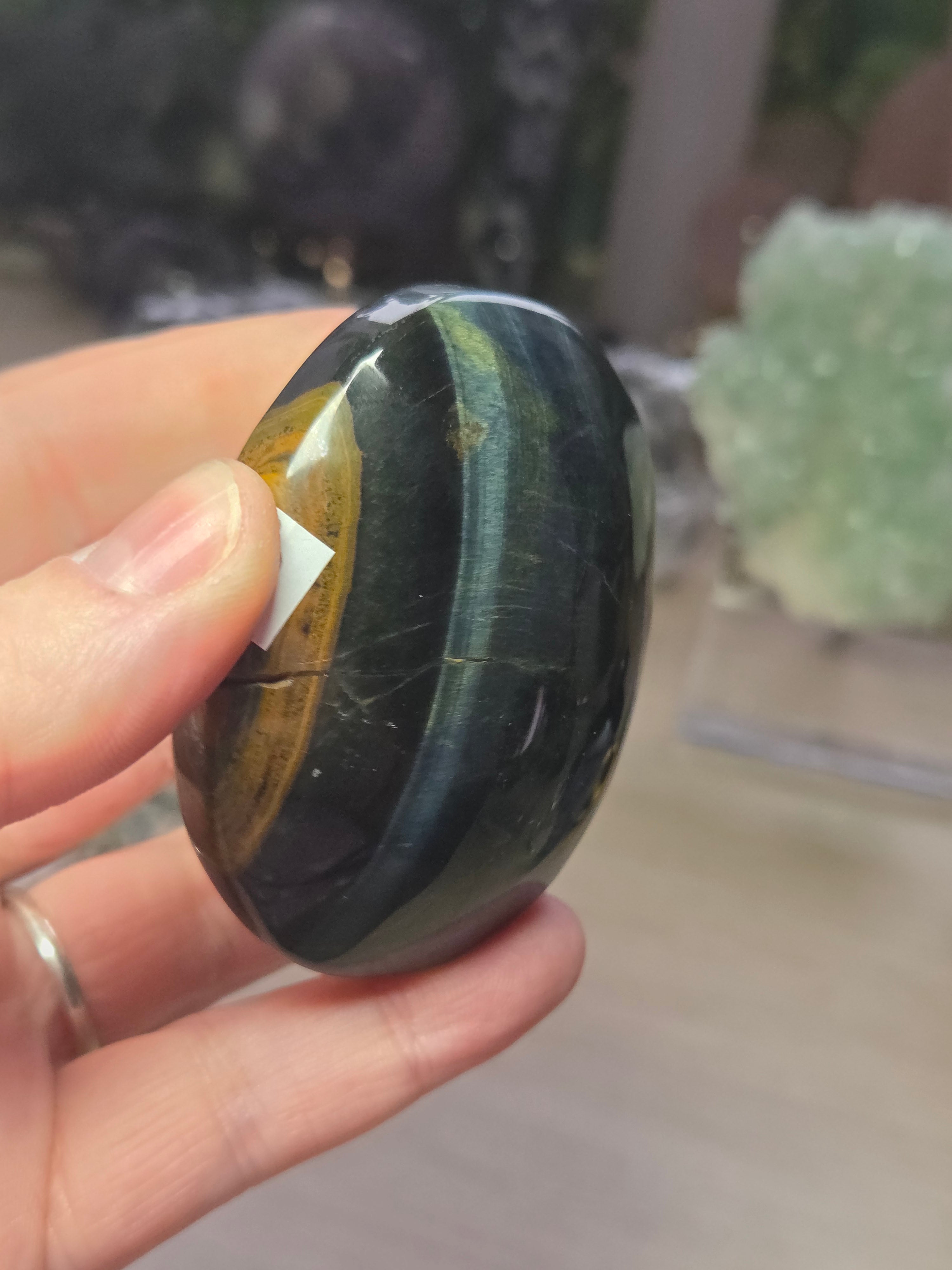 Tigers eye palm stone with Imperfections