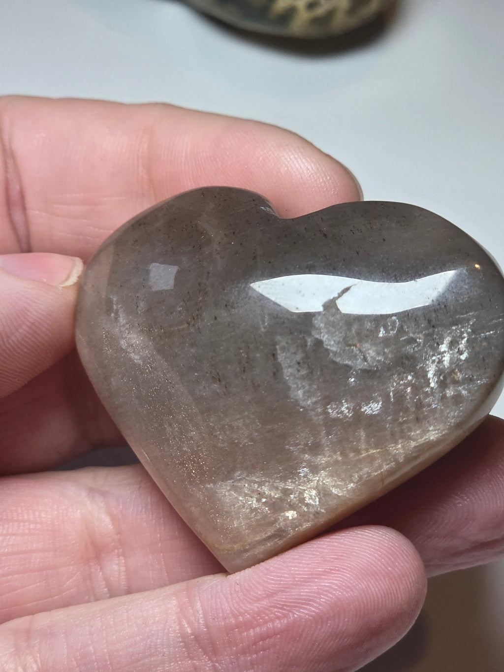 Sunstone and moonstone crystal heart carving with imperfections