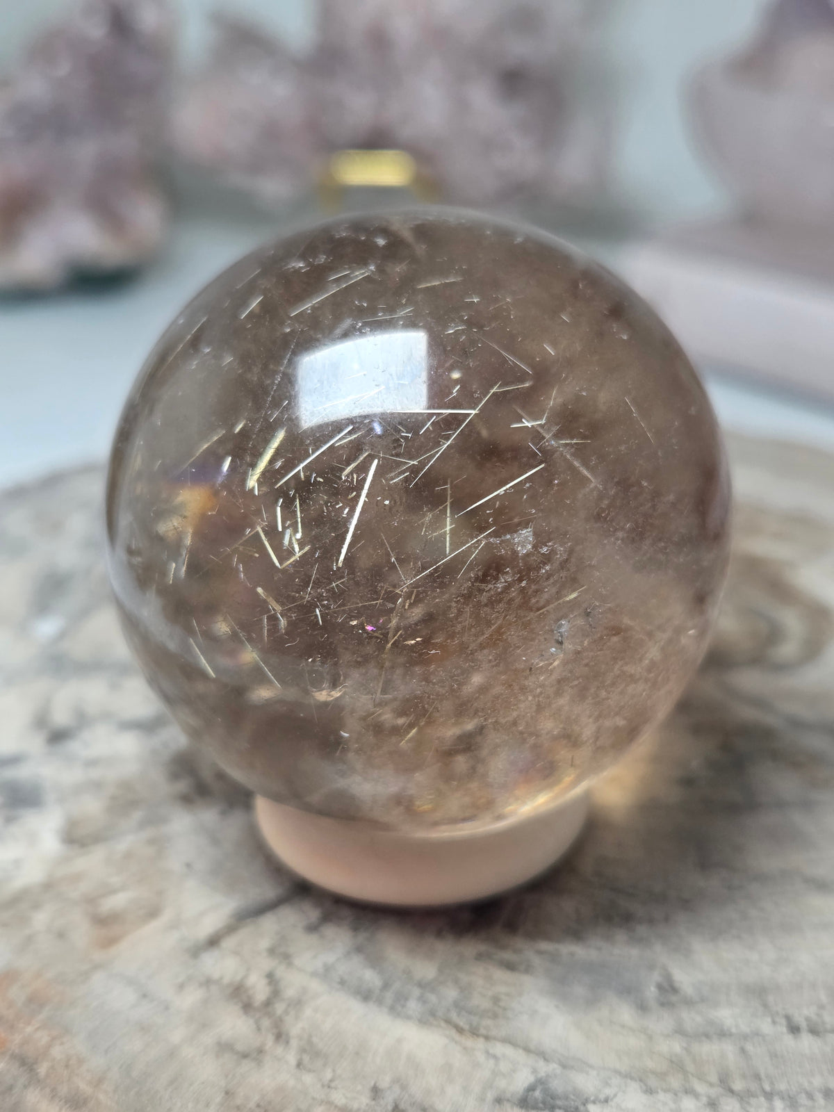 Golden rutile crystal sphere