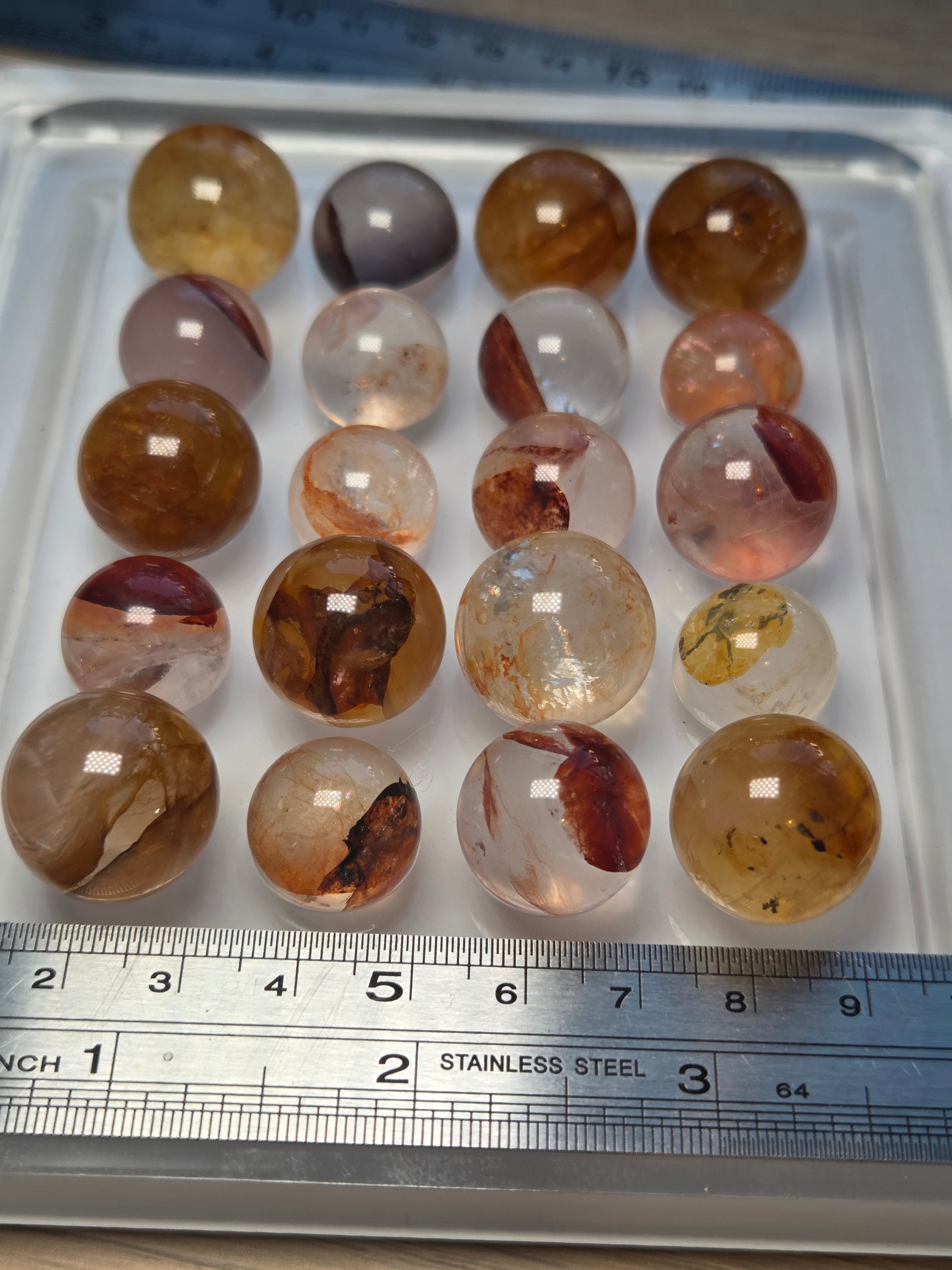 Mini crystal sphere fire quartz and golden healer- with stand