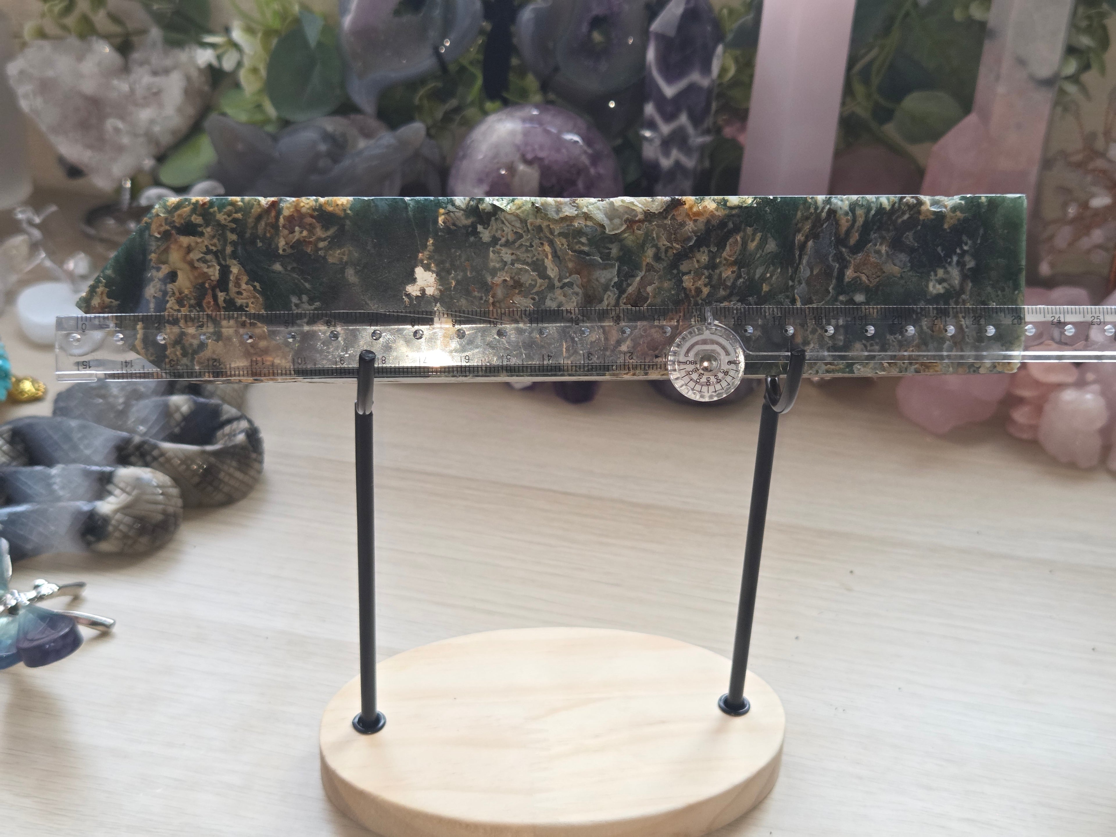 Large Crystal moss agate tower with imperfections as does not stand alone comes with stand