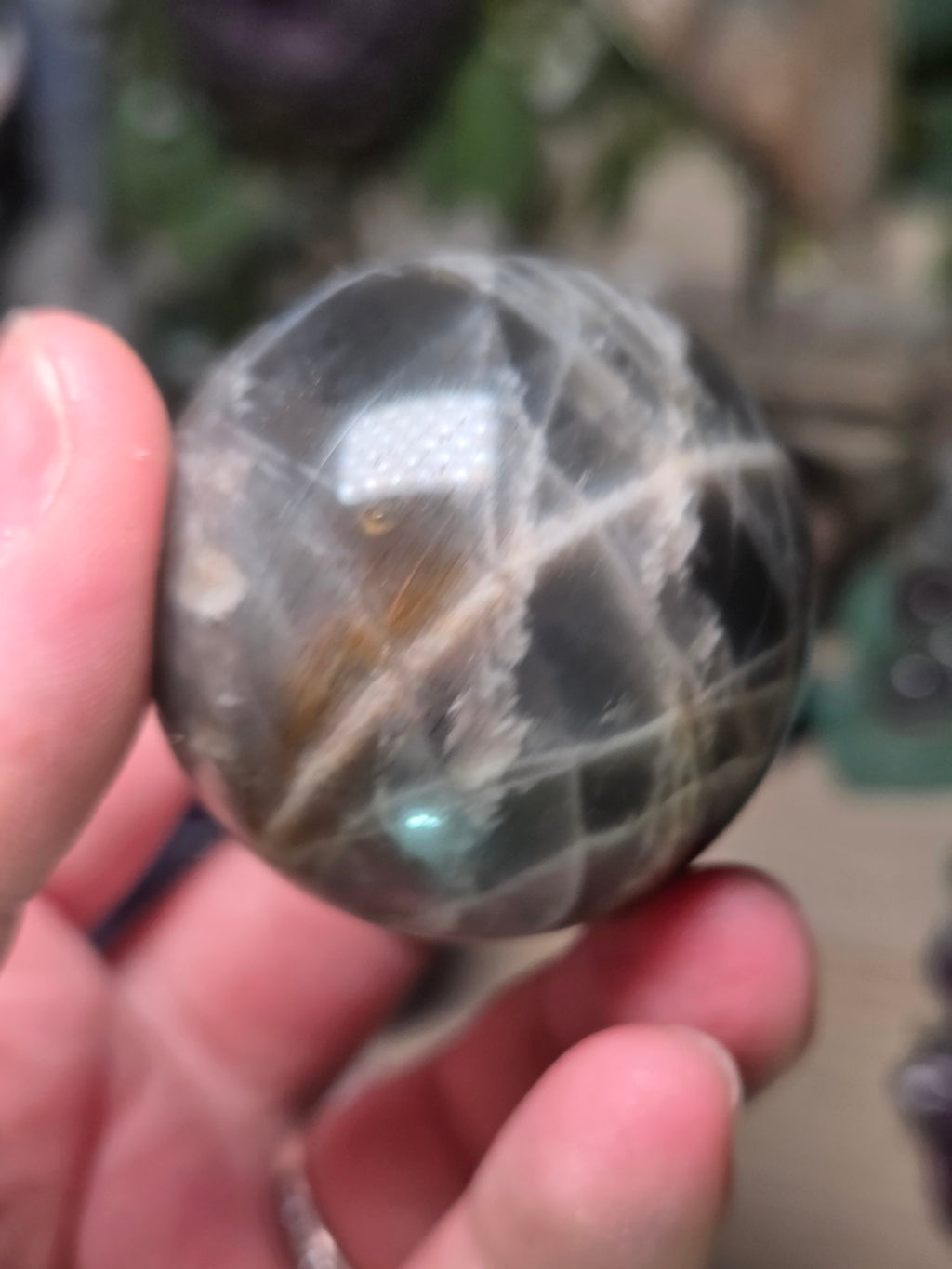 Black Moonstone and sunstone crystal sphere