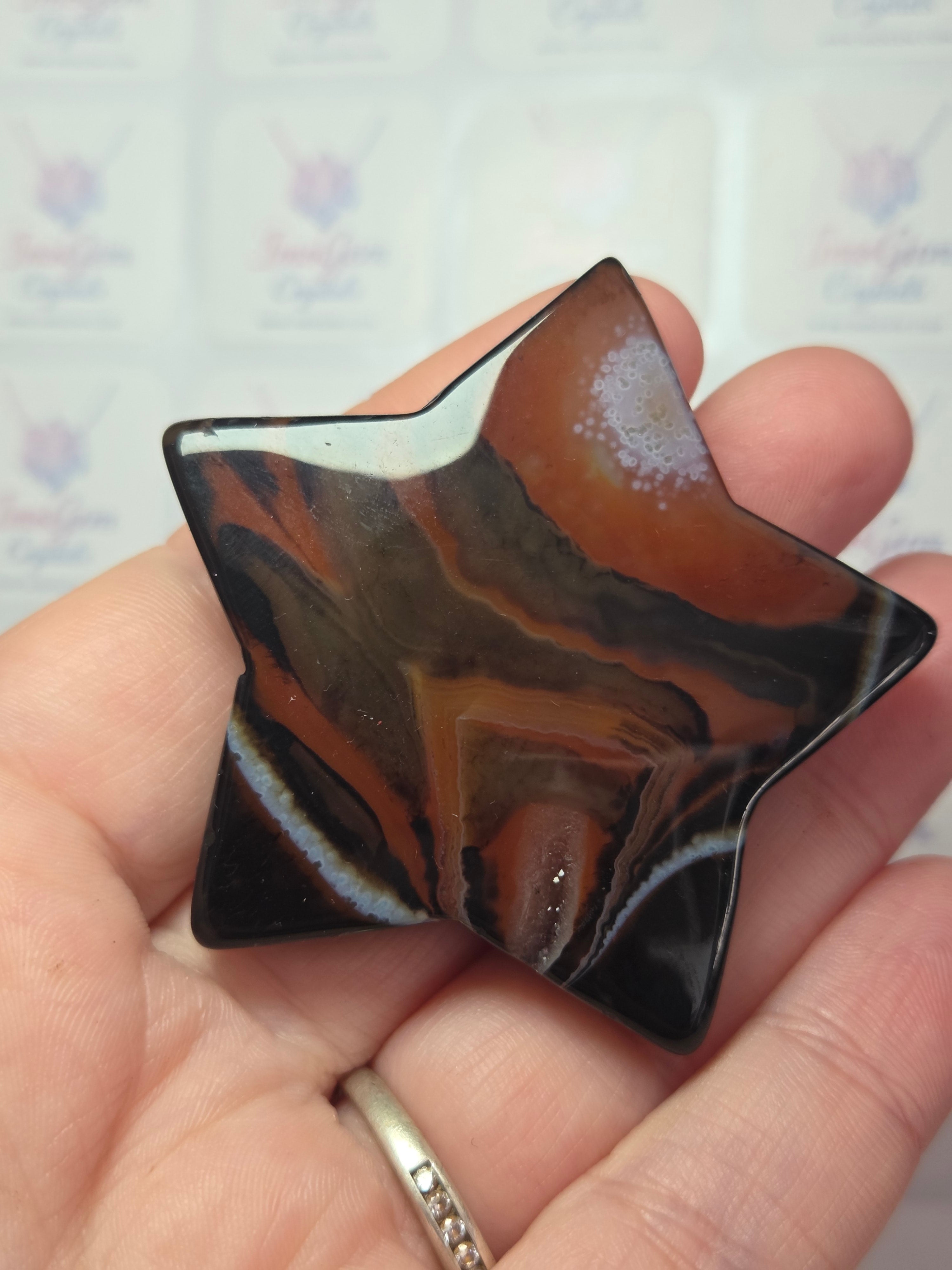 Sardonyx crystal star with duzy