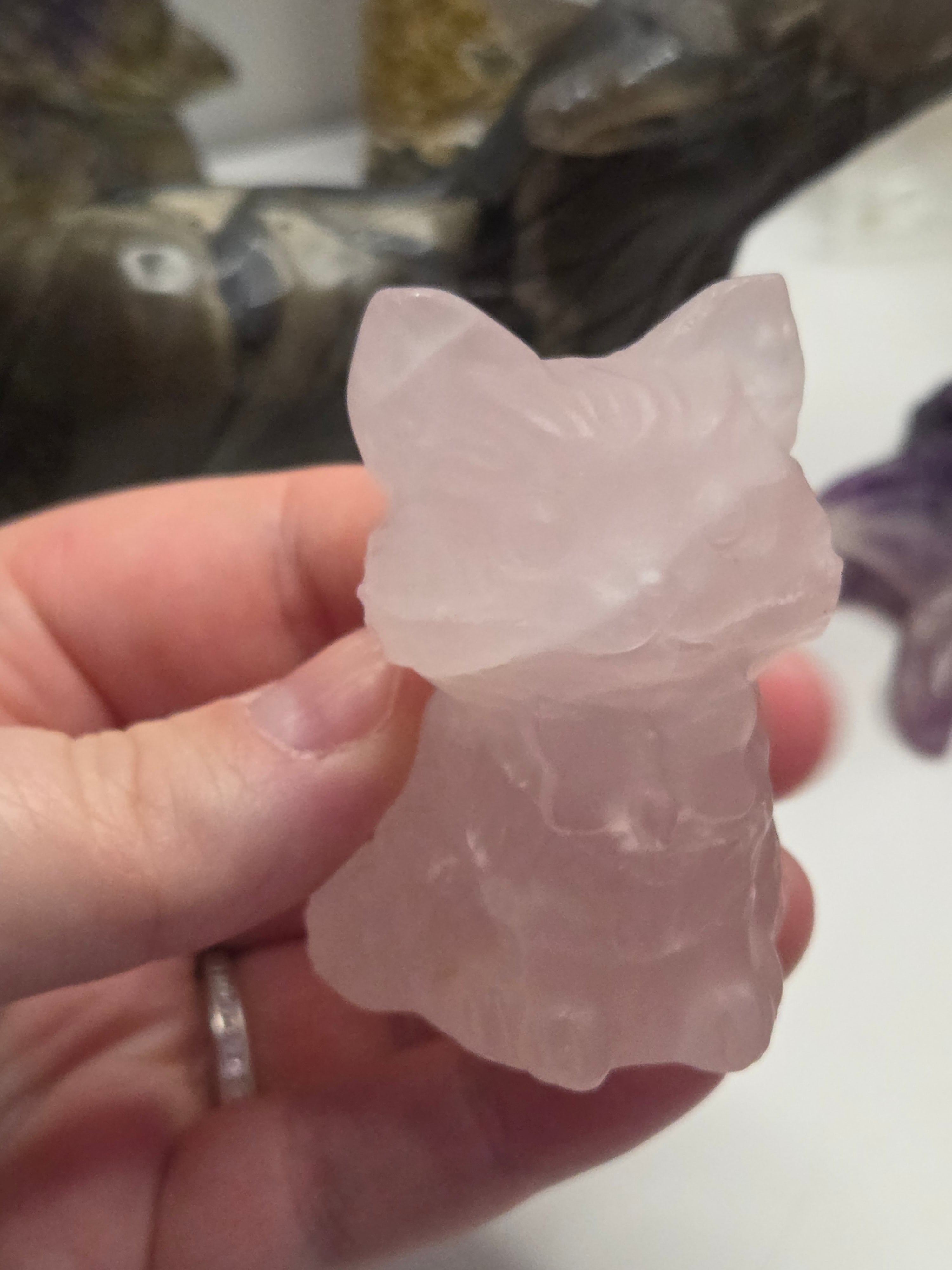 Rose quartz crystal cat carving