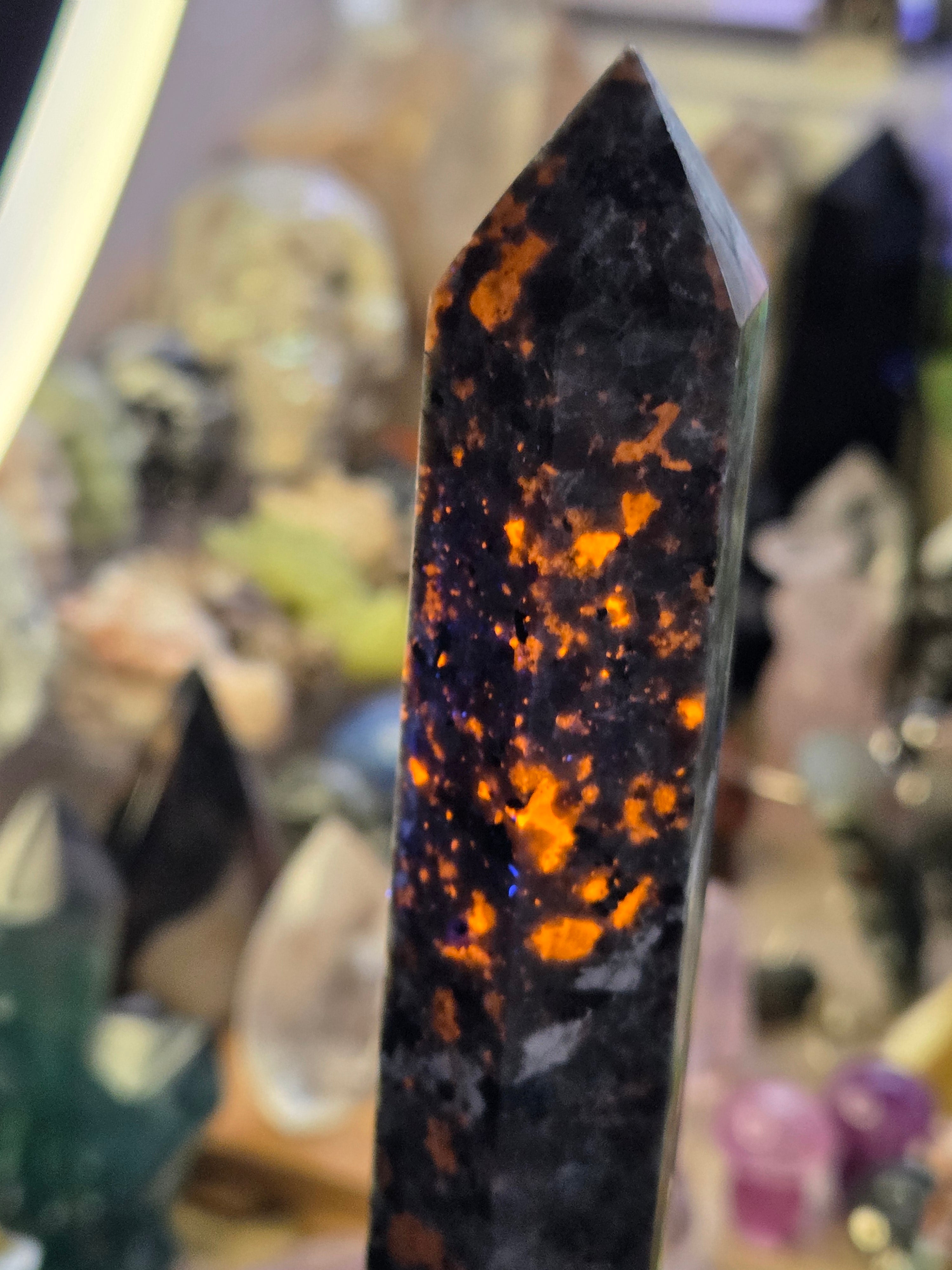 Large Yooperlite crystal tower with orange Uv