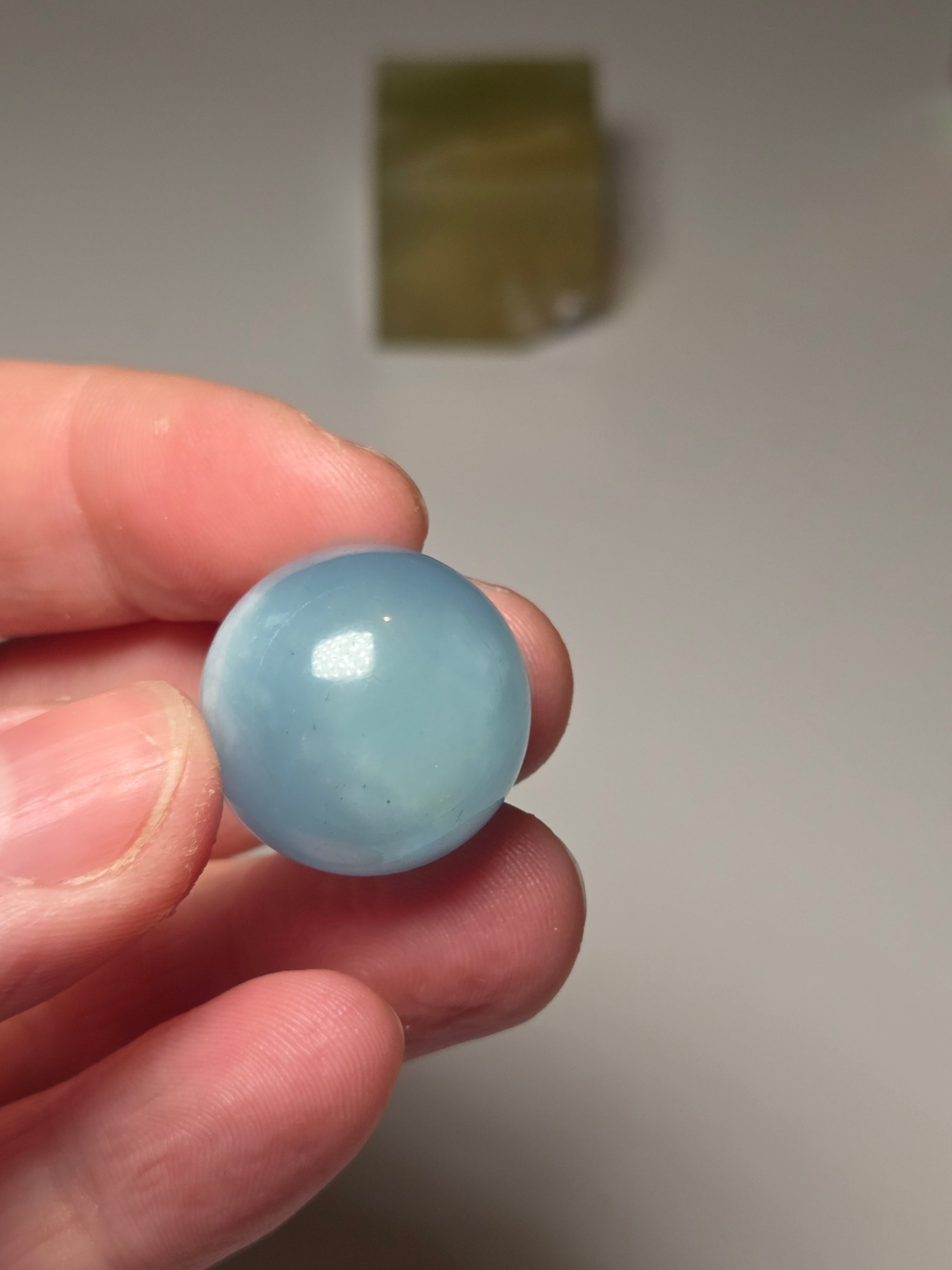 Aquamarine crystal sphere with stand