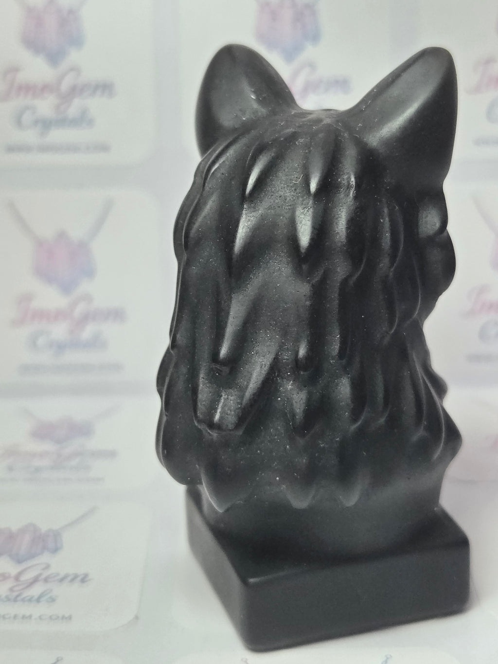 Obsidian crystal wolf head carving