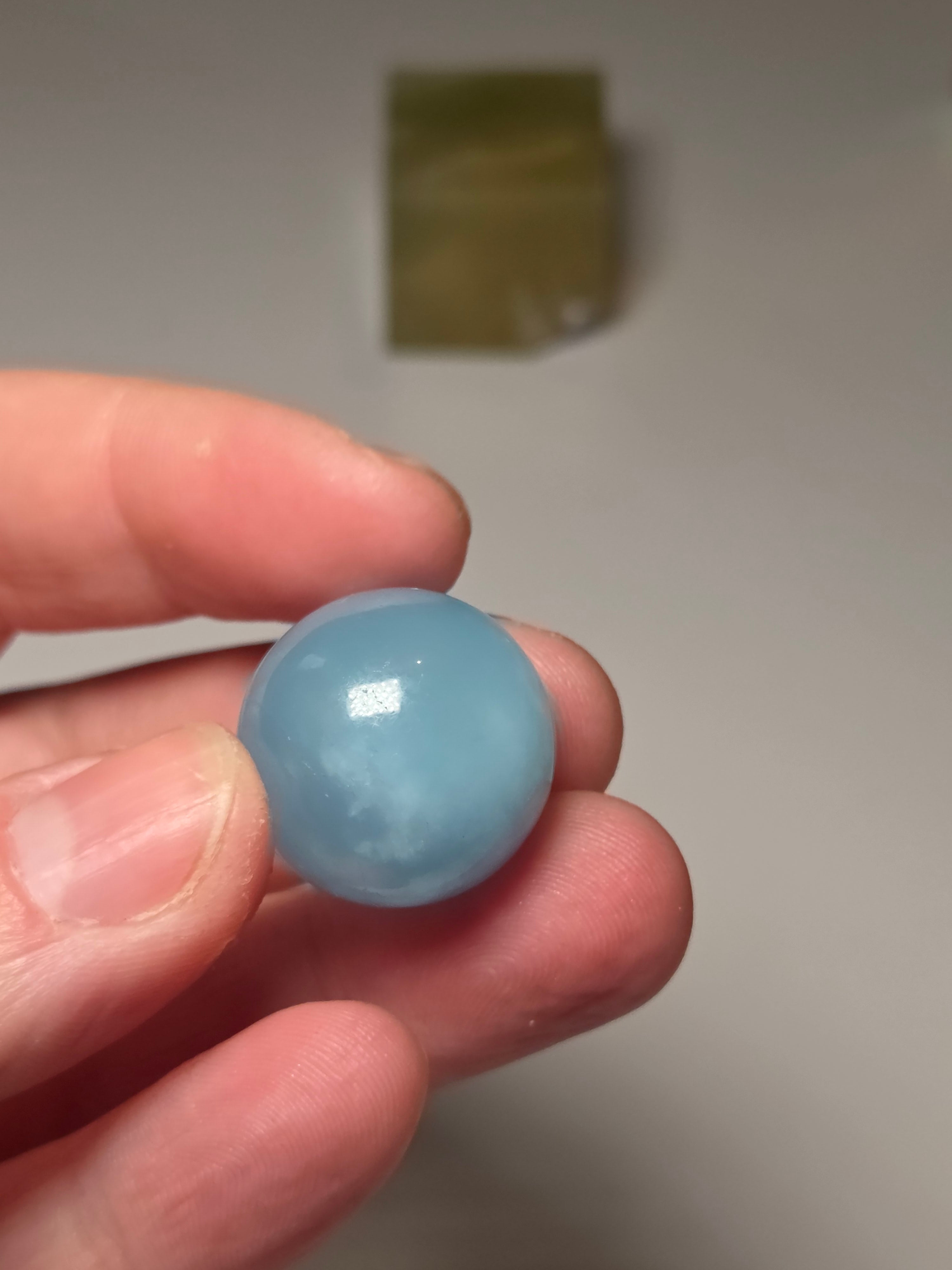 Aquamarine crystal sphere with stand