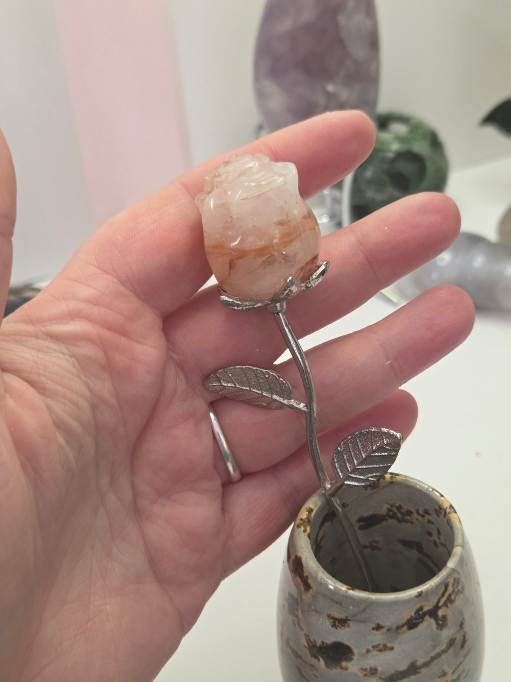 Fire quartz crystal rose carving on a stem