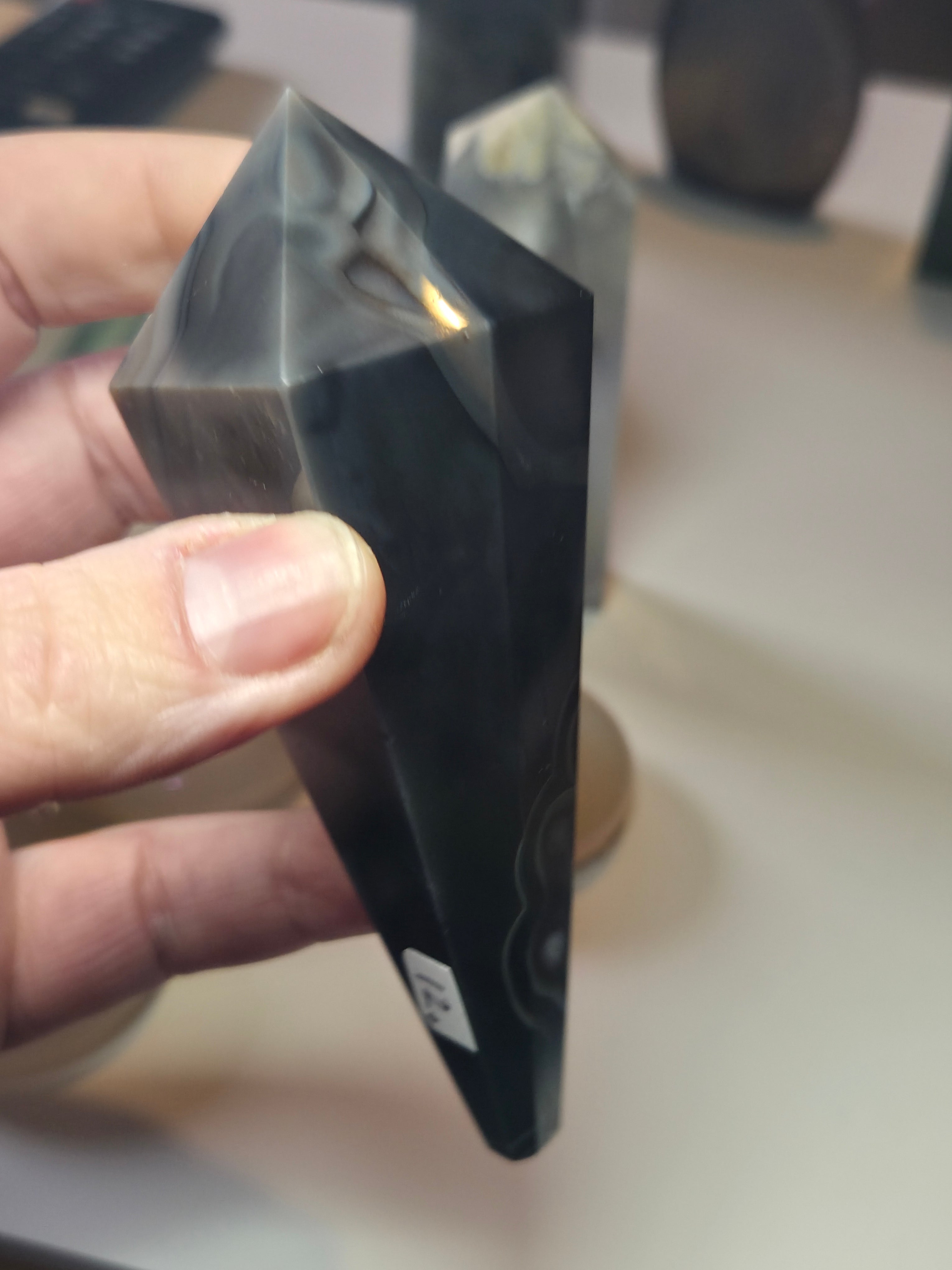 Sardonyx crystal wand with stand may have imperfections