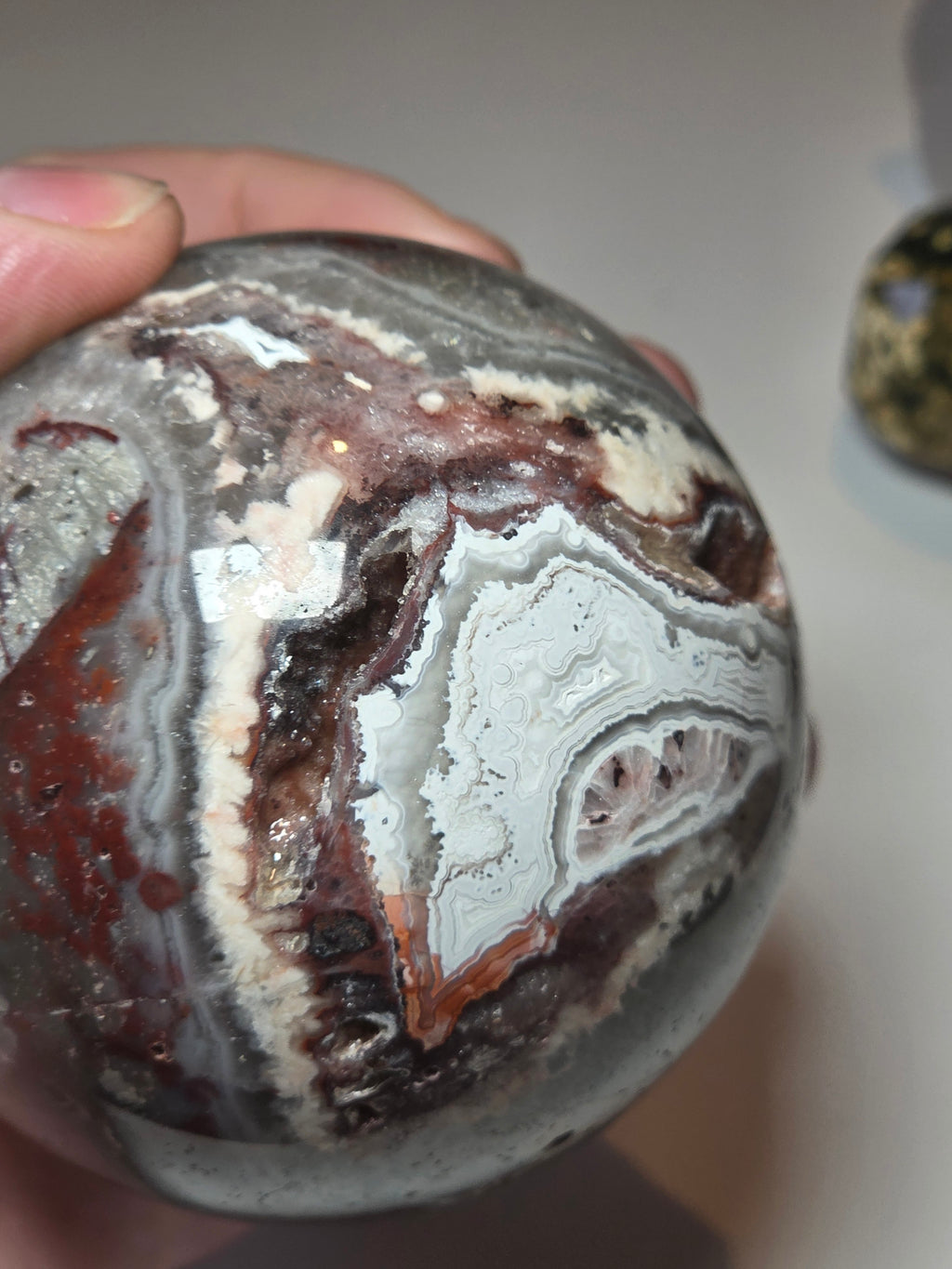Mexican crazy lace agate crystal sphere  with imperfections