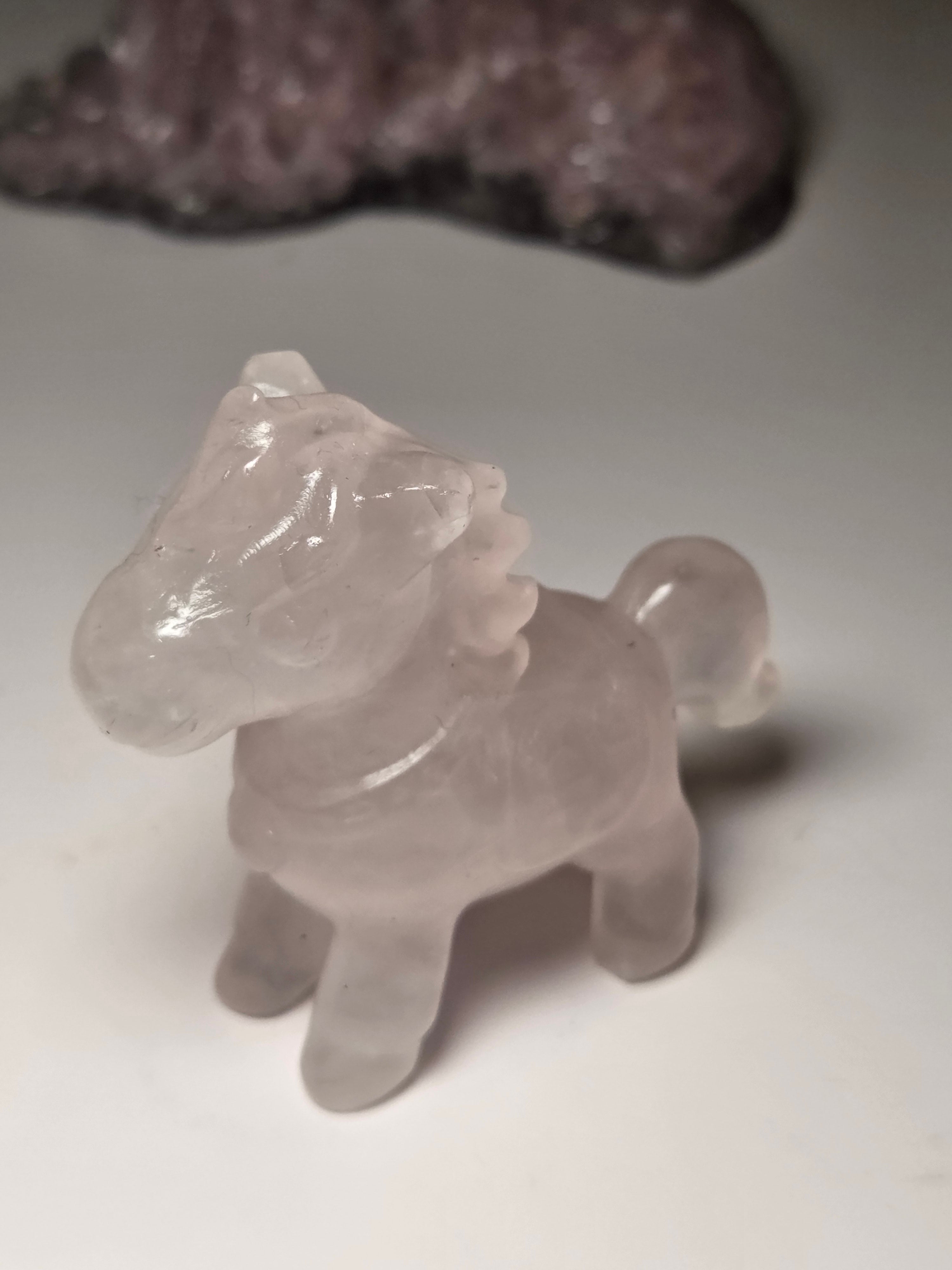 Rose quartz crystal horse carving