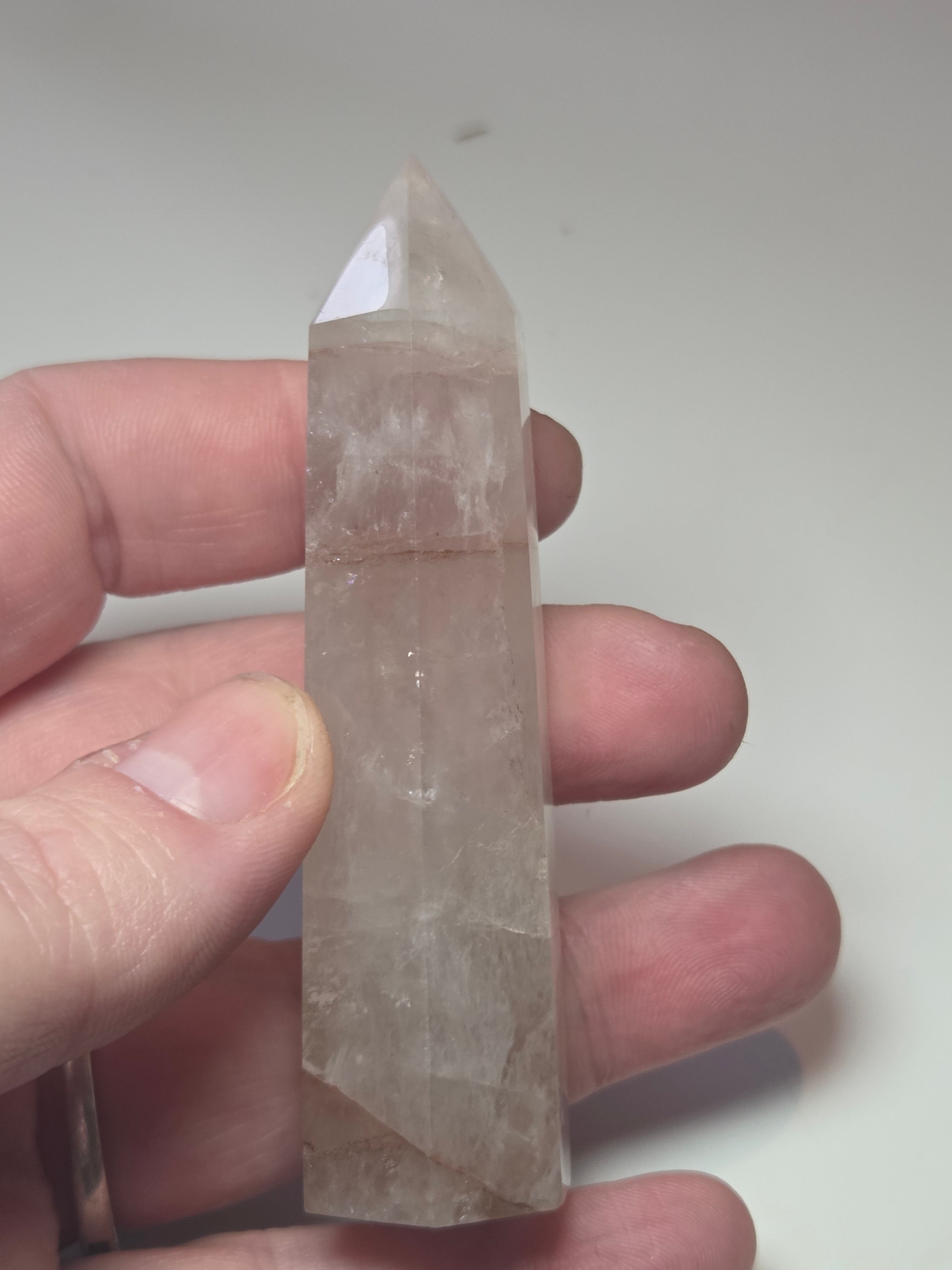 Fire quartz crystal tower carving with imperfections