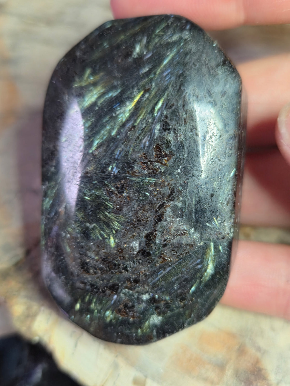 Astrophyllite crystal palm stone