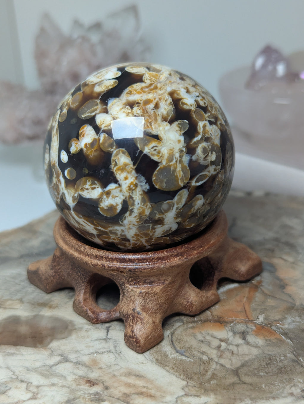 Natural Amber with calcite crystal sphere