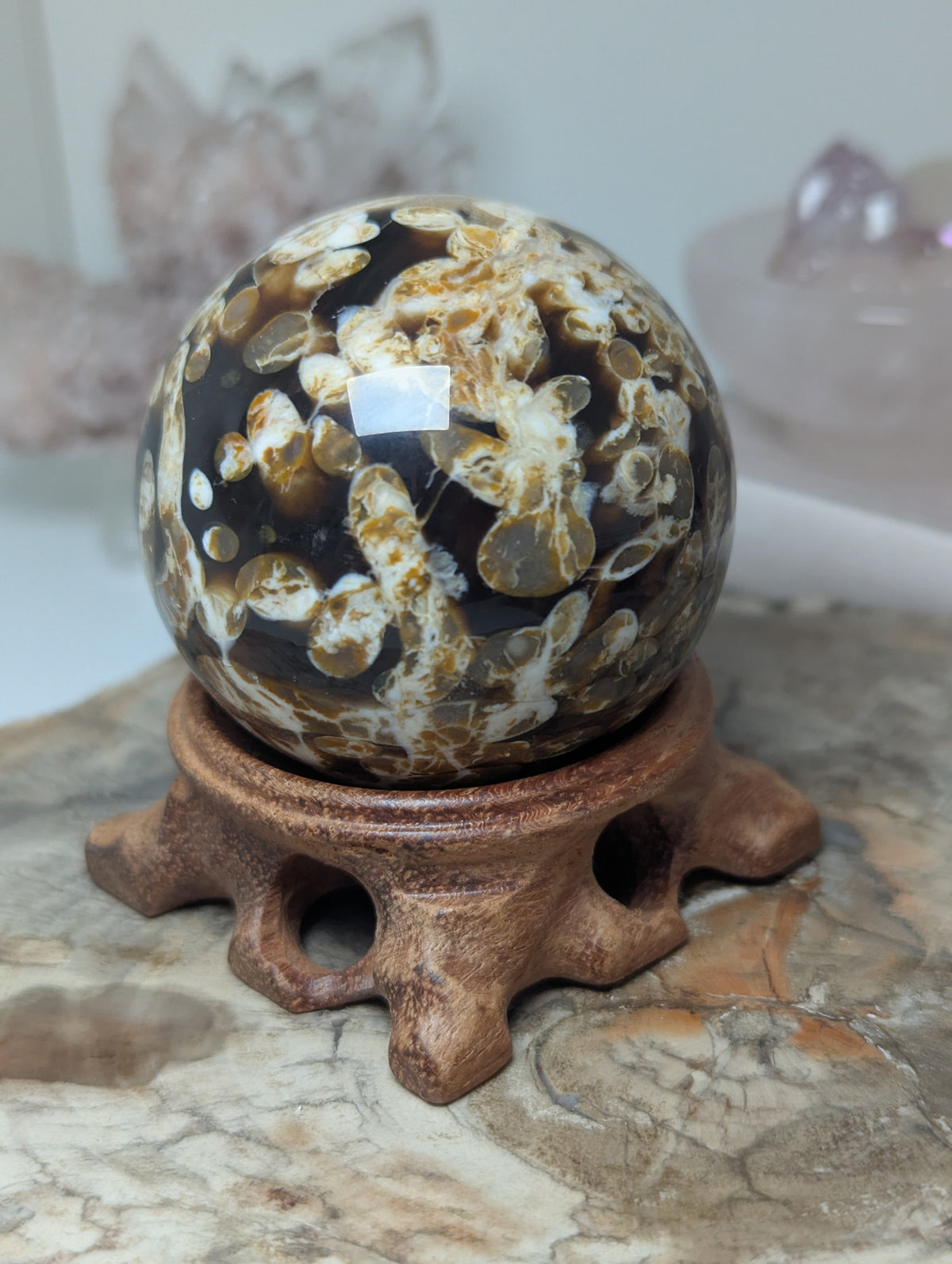 Natural Amber with calcite crystal sphere