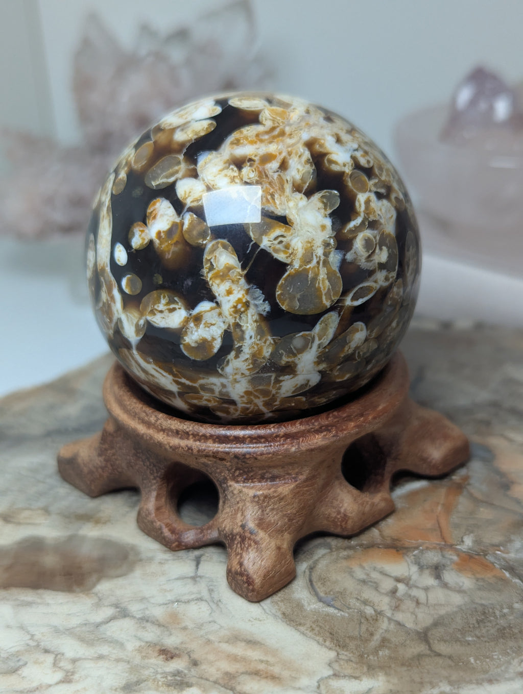 Natural Amber with calcite crystal sphere