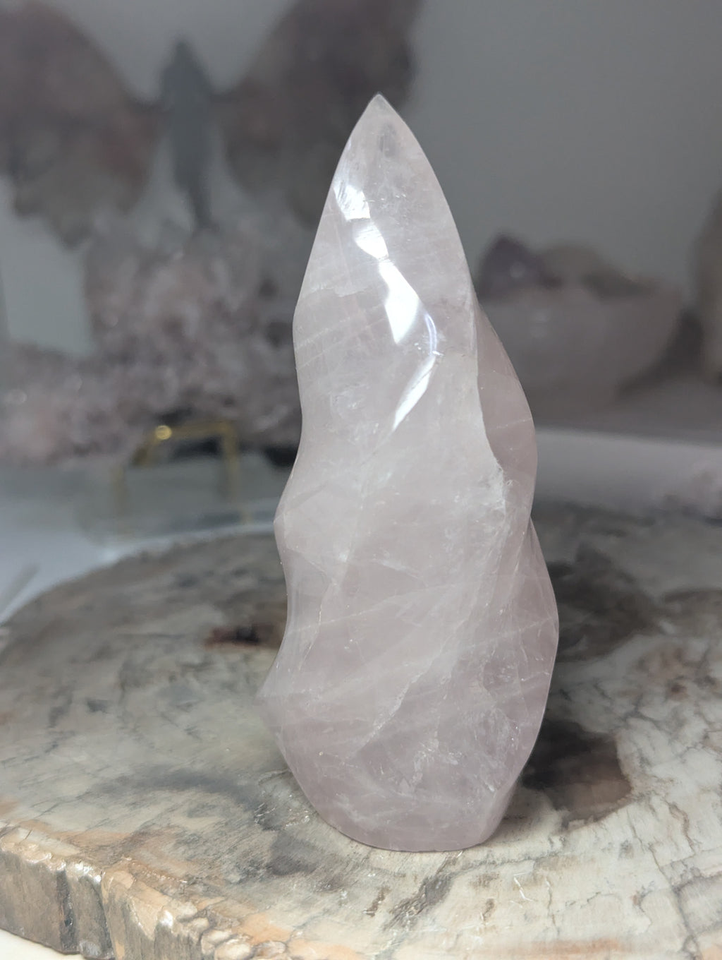 Rose quartz crystal flame carving