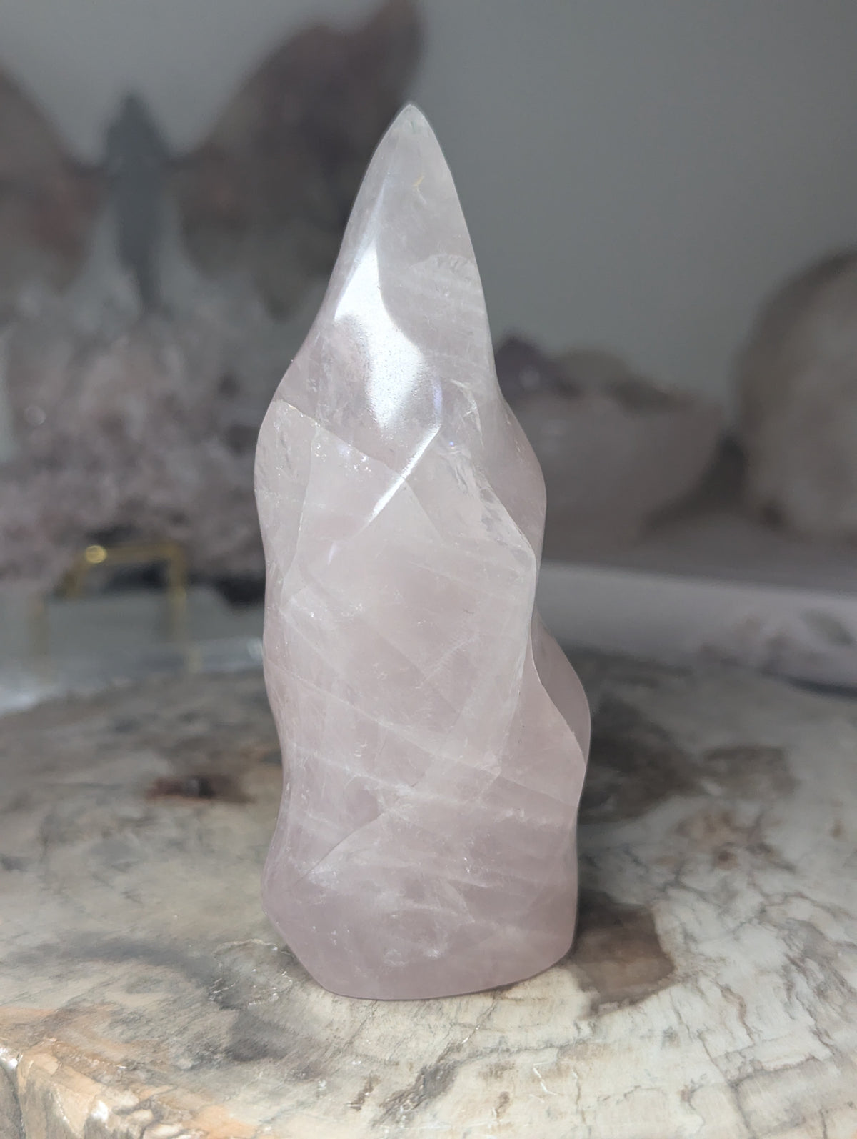 Rose quartz crystal flame carving