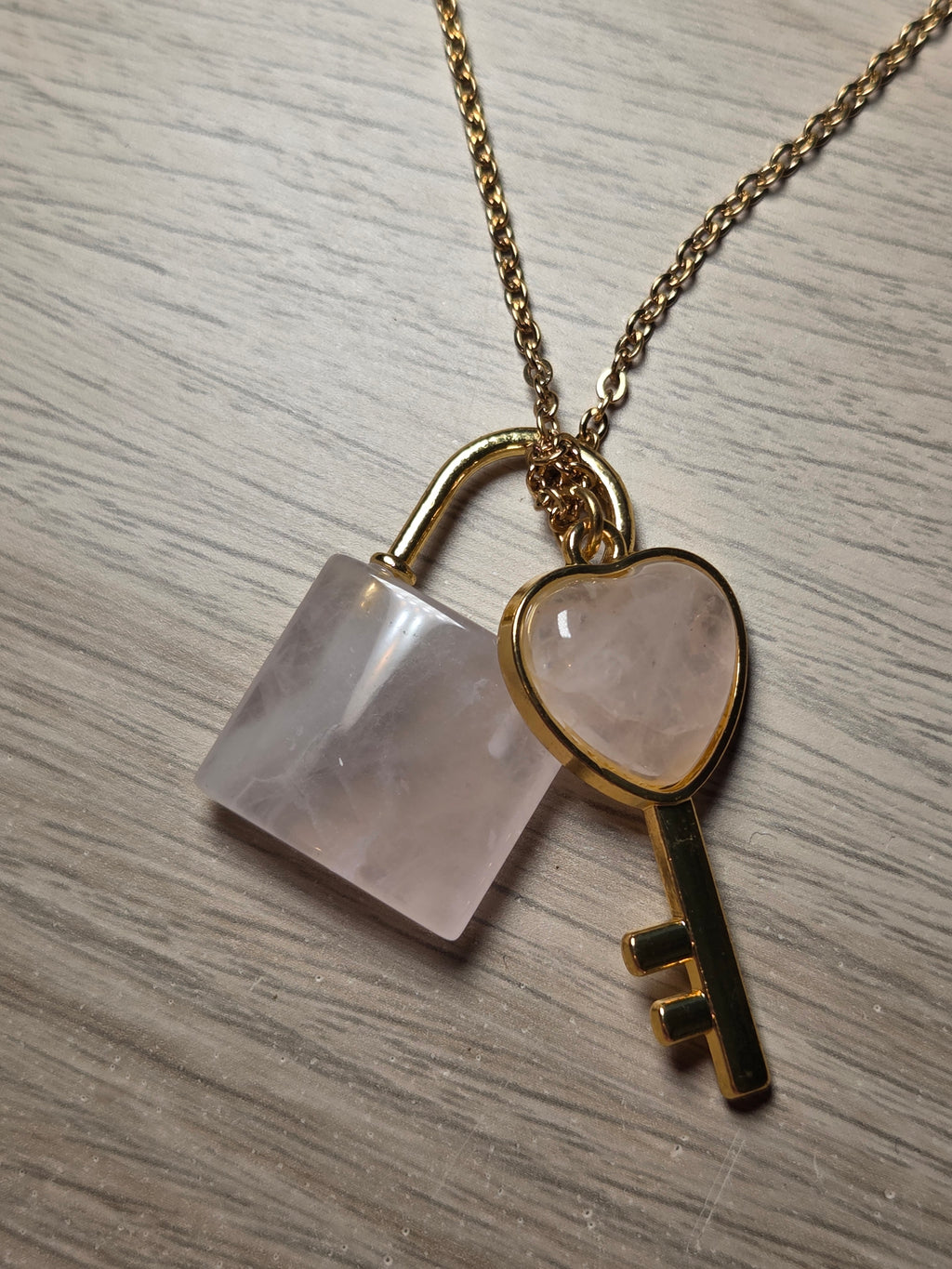 Rose quartz crystal key and log necklace