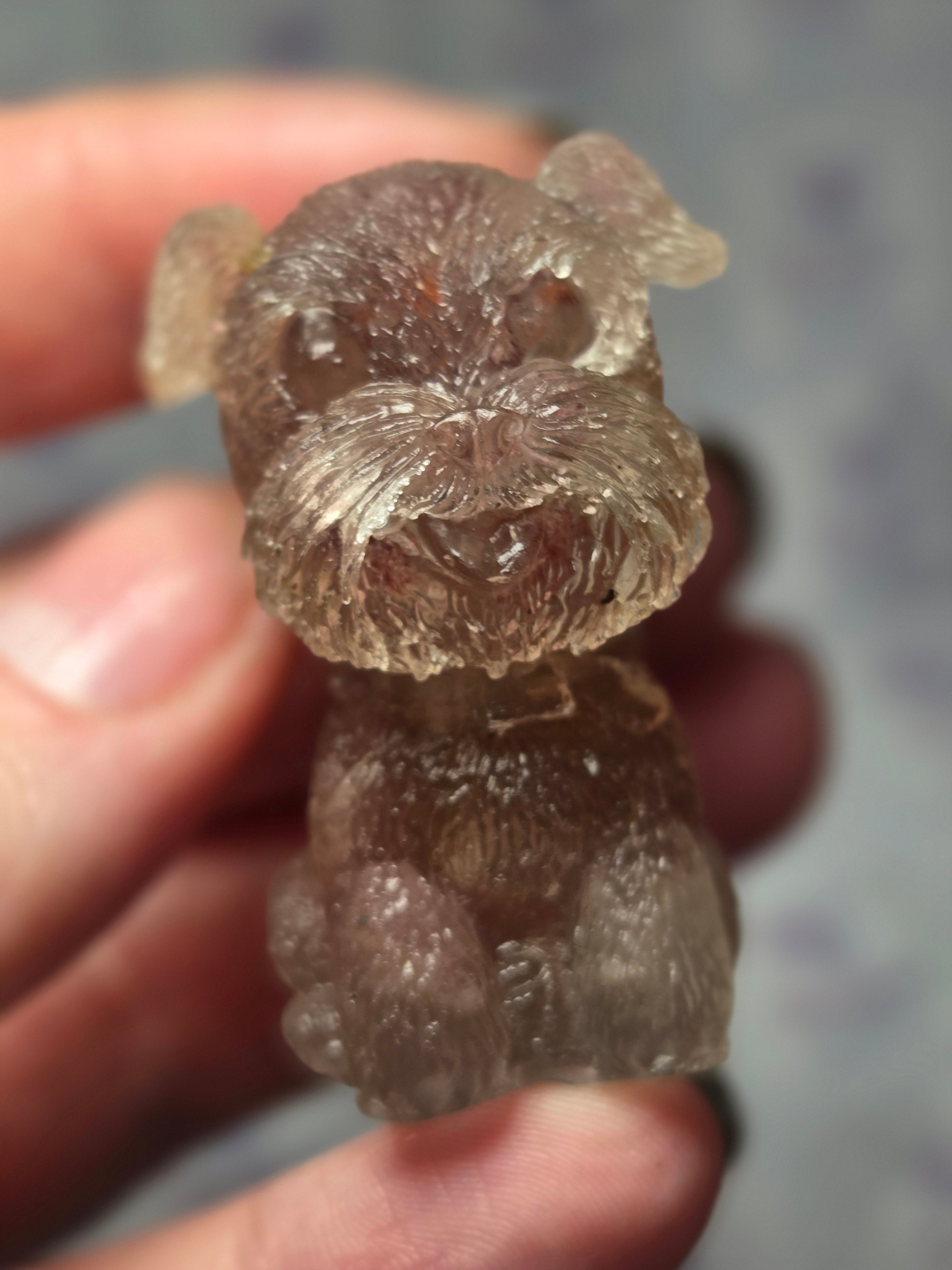 Strawberry quartz crystal shnowzer carving in resin