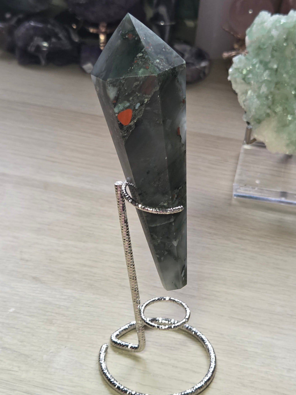 African bloodstone wand carving
