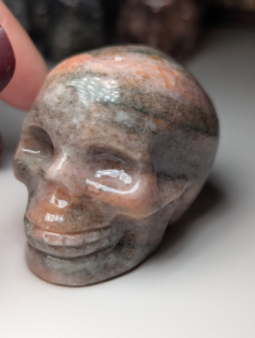 Sunstone crystal skull carving