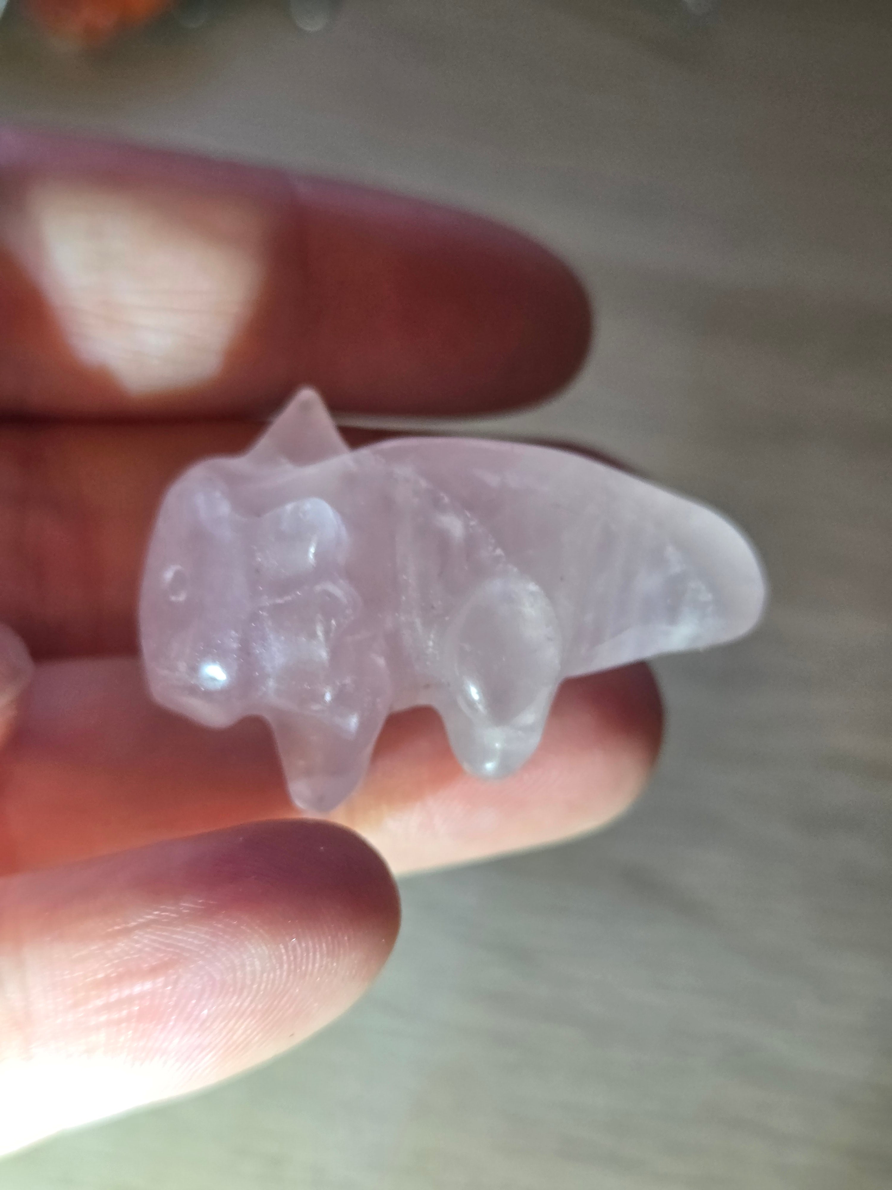 Rose quartz crystal axolotl carving